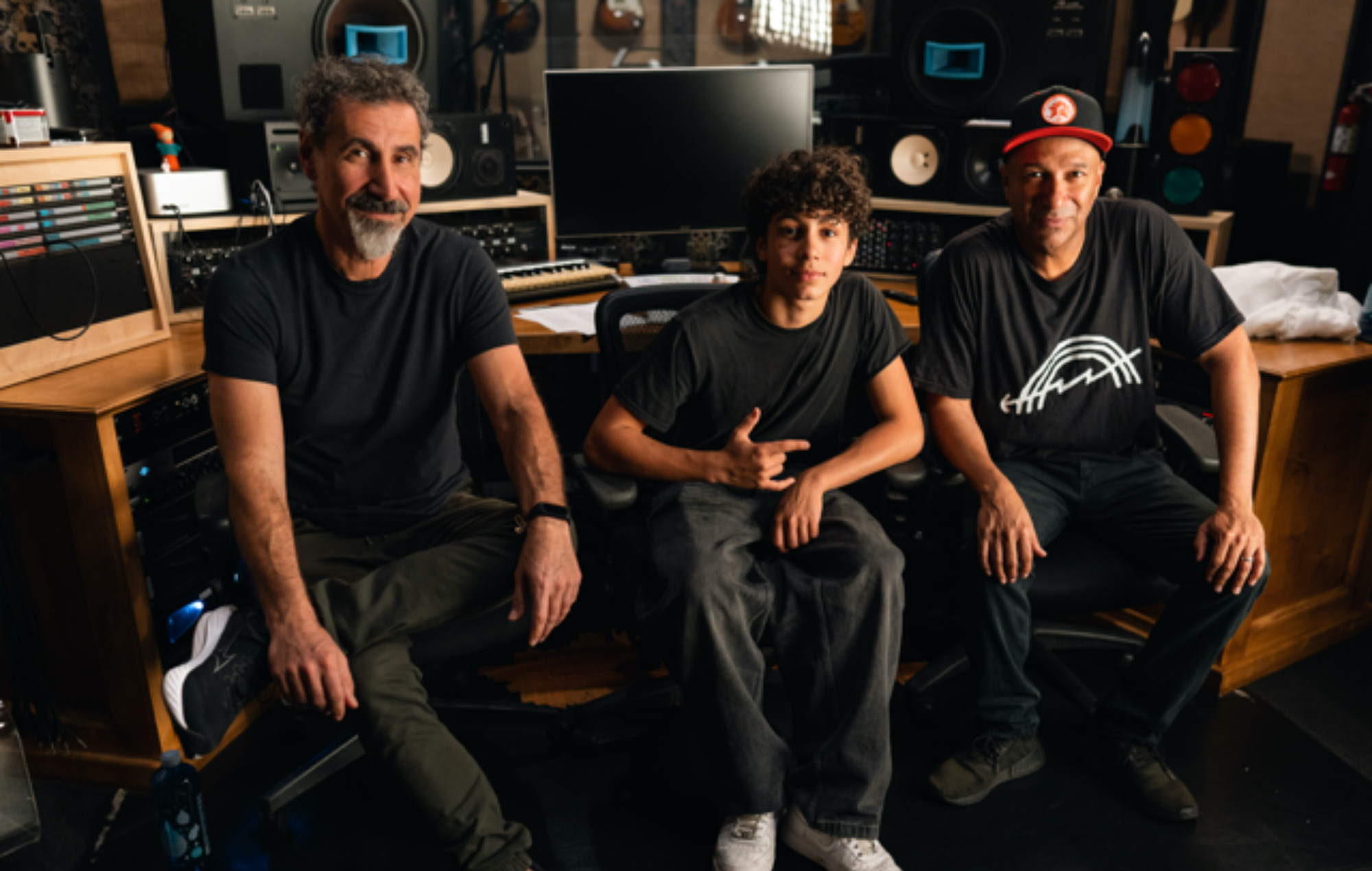 Tom Morello teams up with System Of A Down&#8217;s Serj Tankian and son Roman for powerful new single &#8216;Adjourn It&#8217;: &#8220;Every act of art is an act of resistance&#8221;
