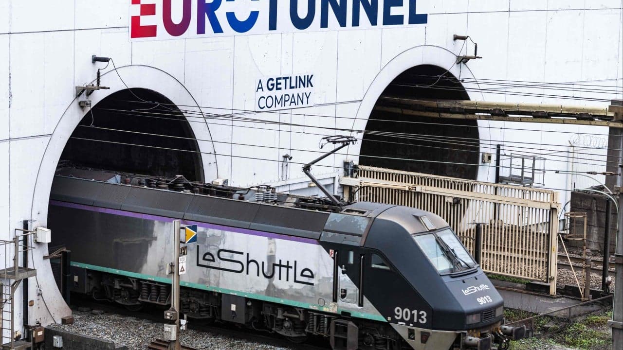 Bus hits train near Channel Tunnel in France, injuring 19