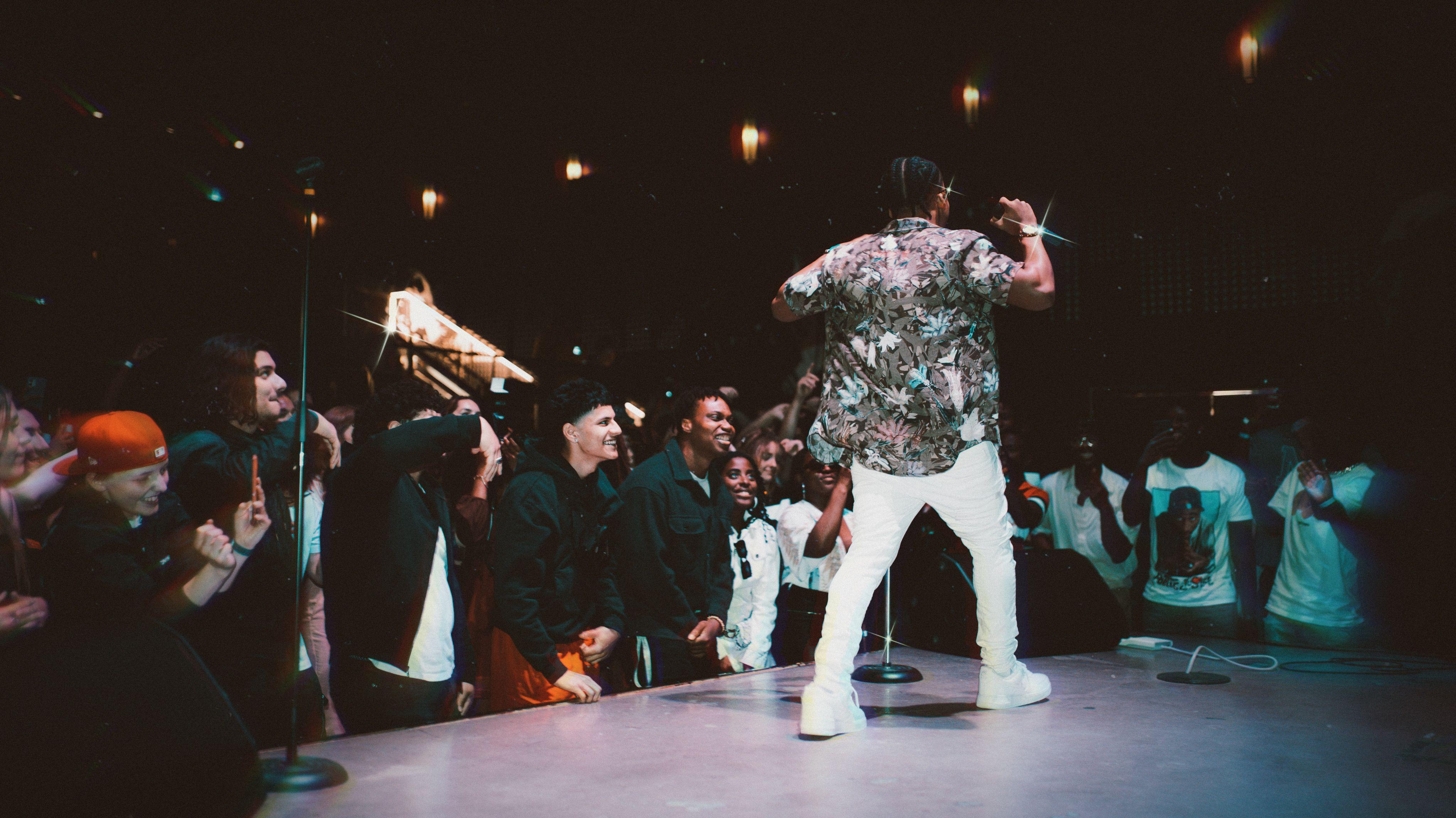 Singer energizes the crowd during a live performance in Edmonton, Canada.