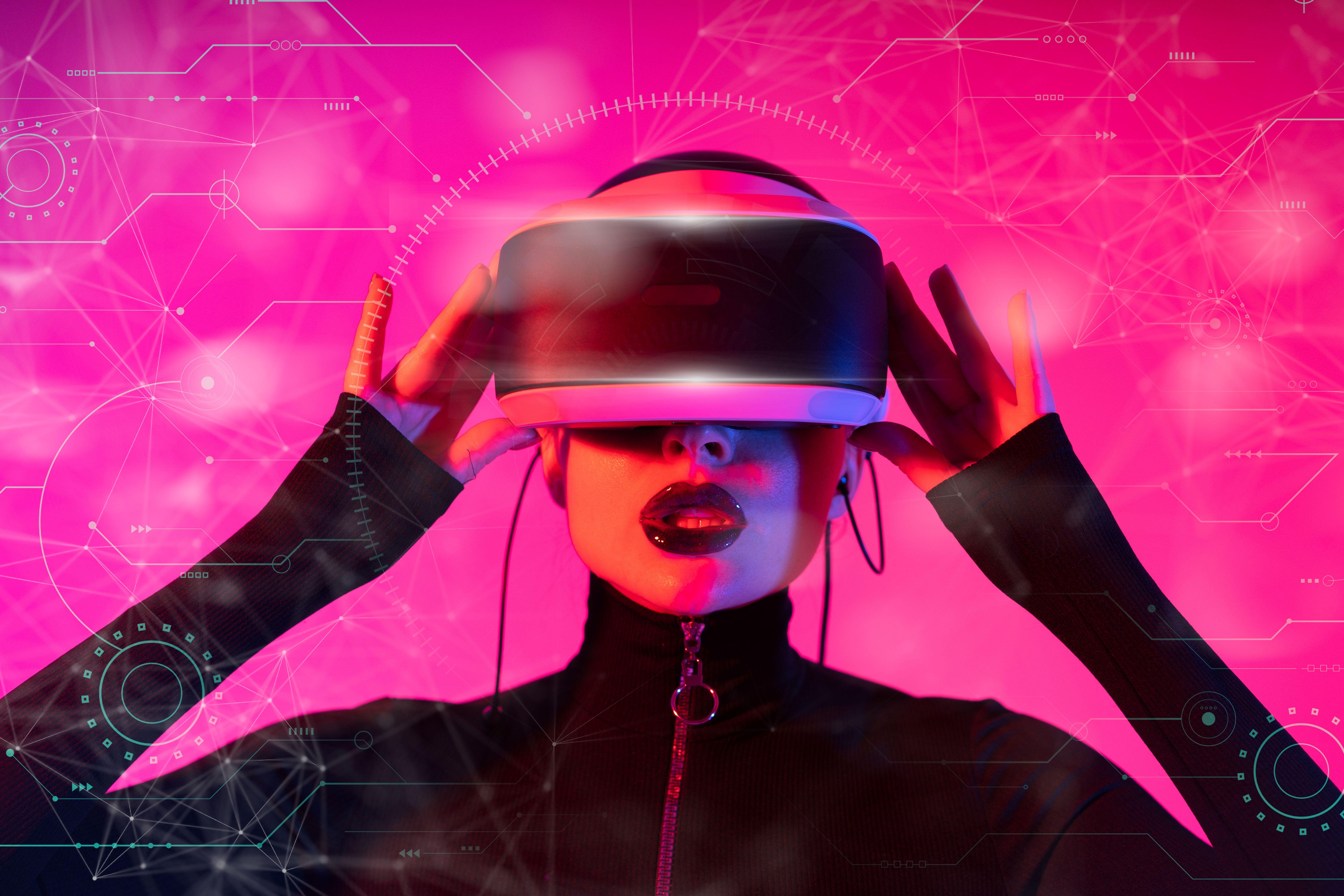 A stylish woman interacts with futuristic VR technology in a vibrant setting.
