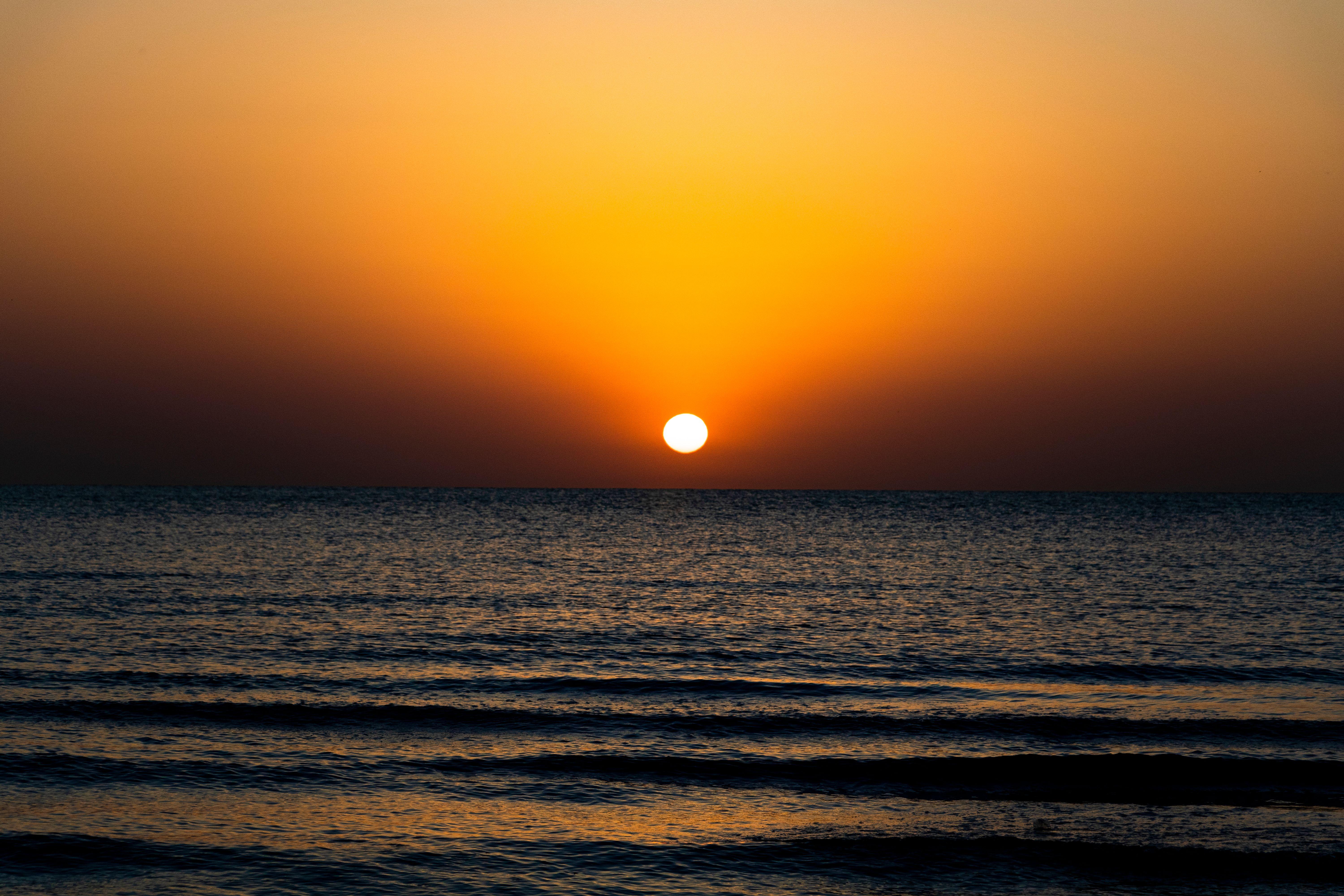 Stunning sunset view over the Caspian Sea, capturing serene waves and golden hues.