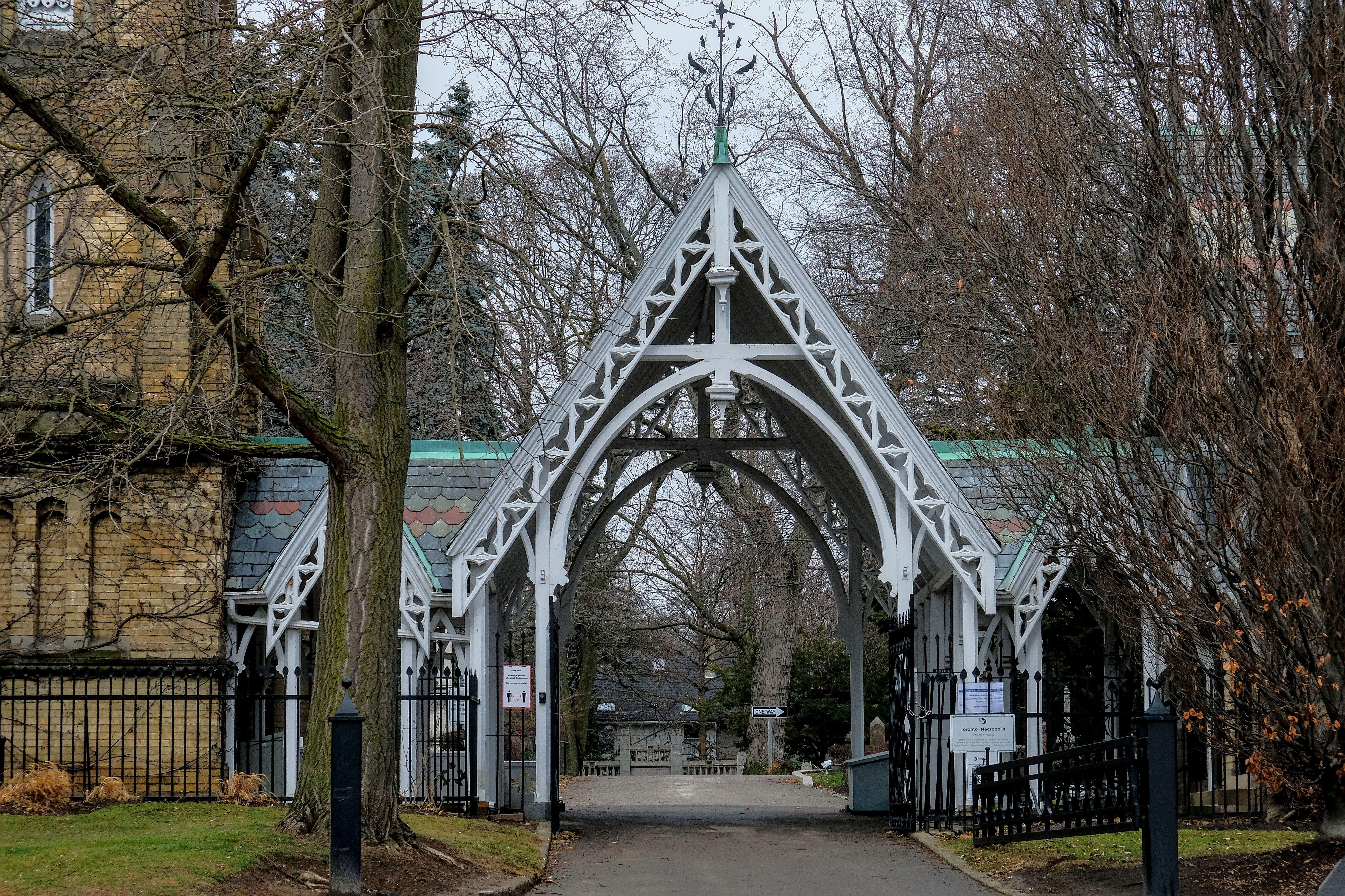 Ornate Gothic-style entrance gate at St. James Cathedral in Toronto, showcasing architectural elegance.
