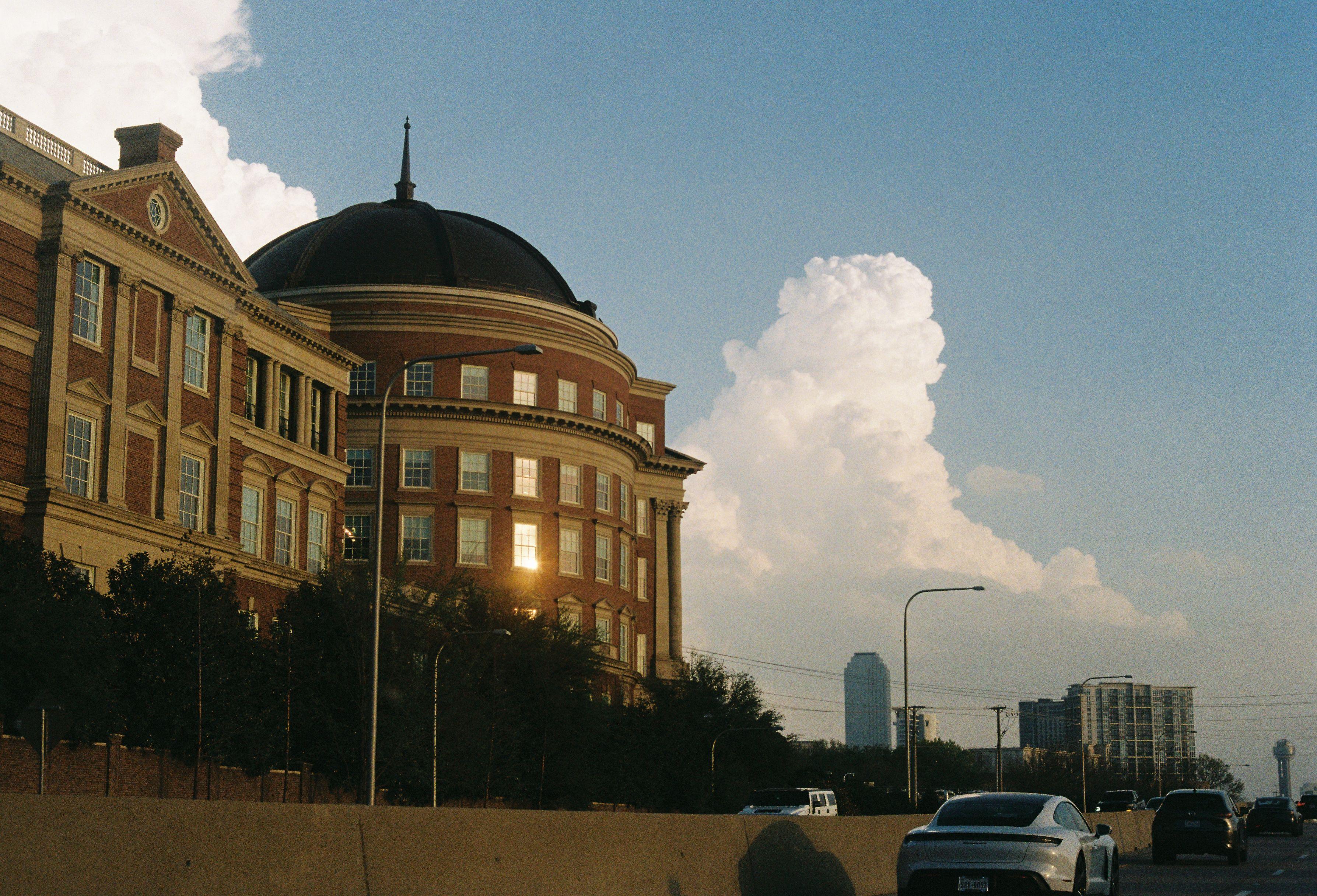View of a historic dome building in Dallas, Texas, featuring urban architecture.