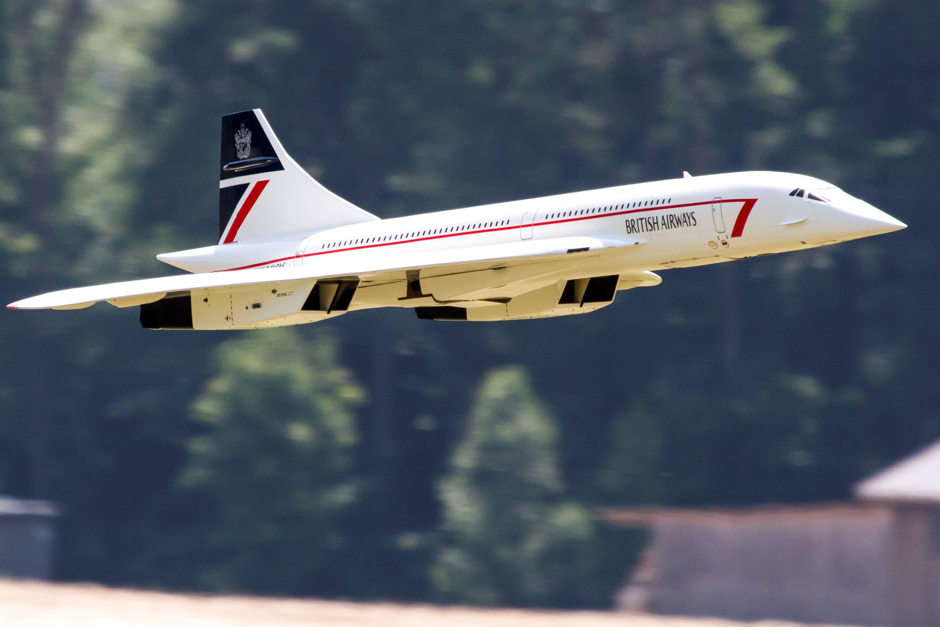 RC model Concorde jet flying outdoors in British Airways livery.