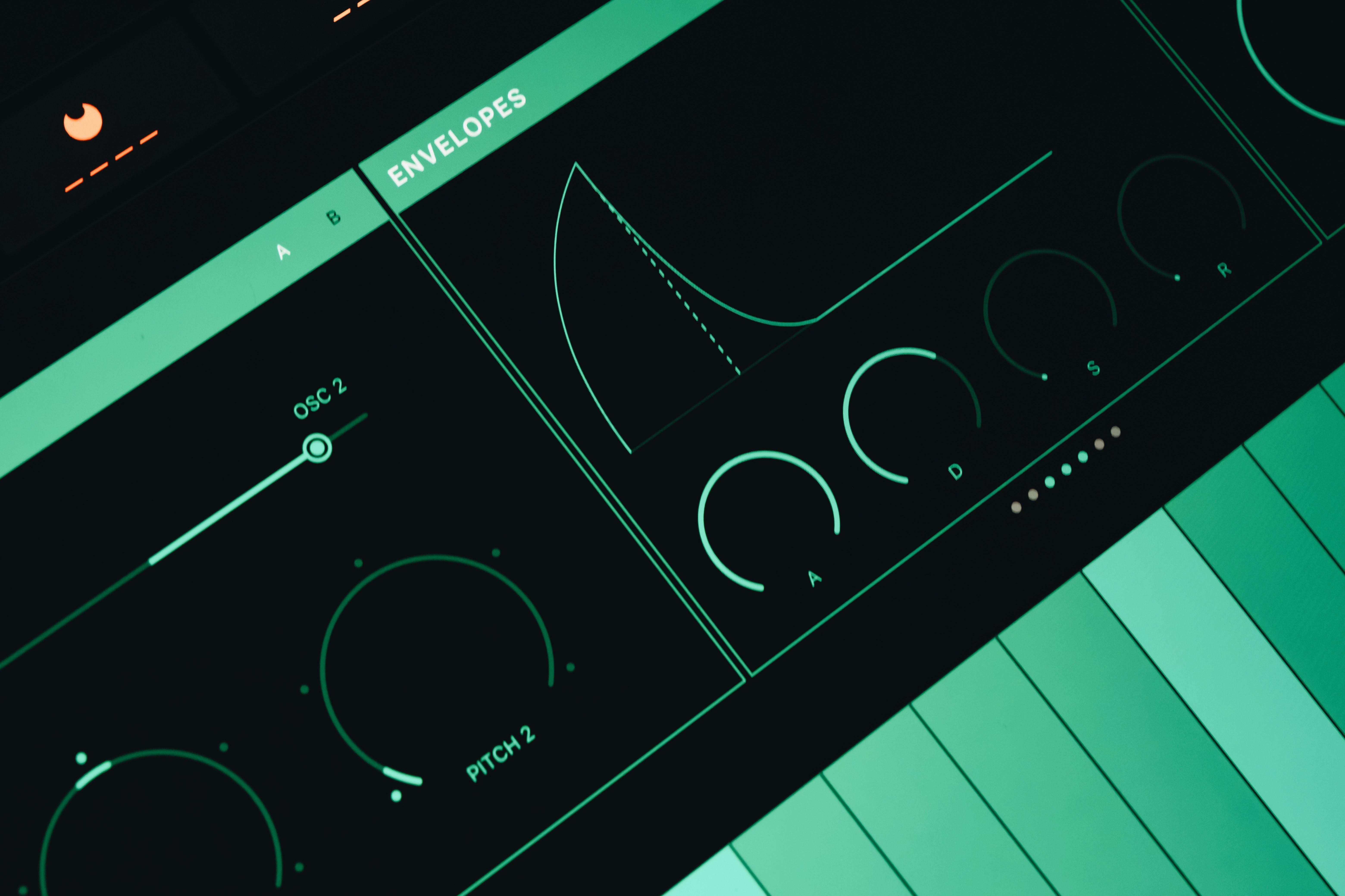 Close-up view of a synthesizer interface showing envelopes and oscillators.