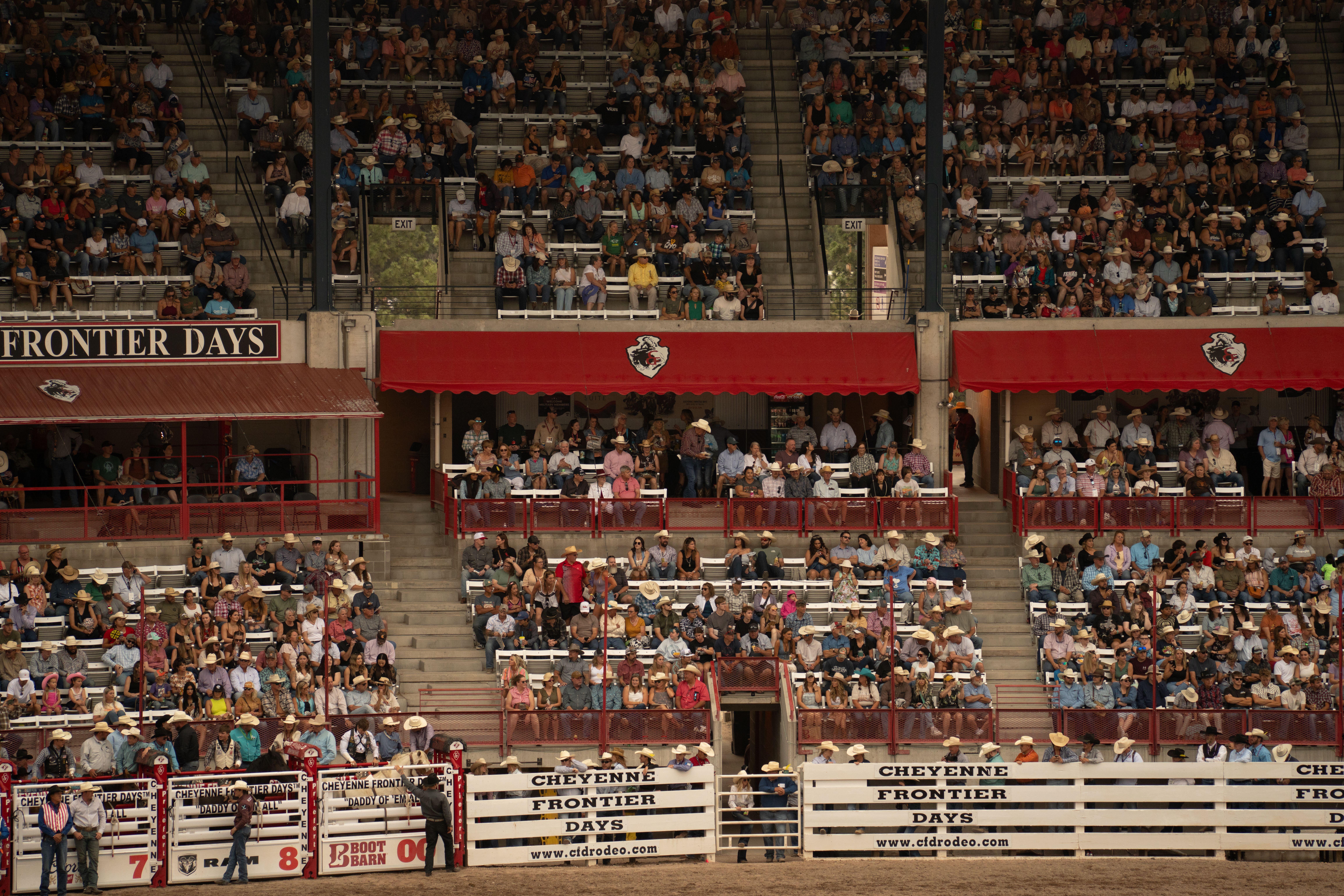 A large crowd enjoys the lively atmosphere at Cheyenne Frontier Days Rodeo in Wyoming.