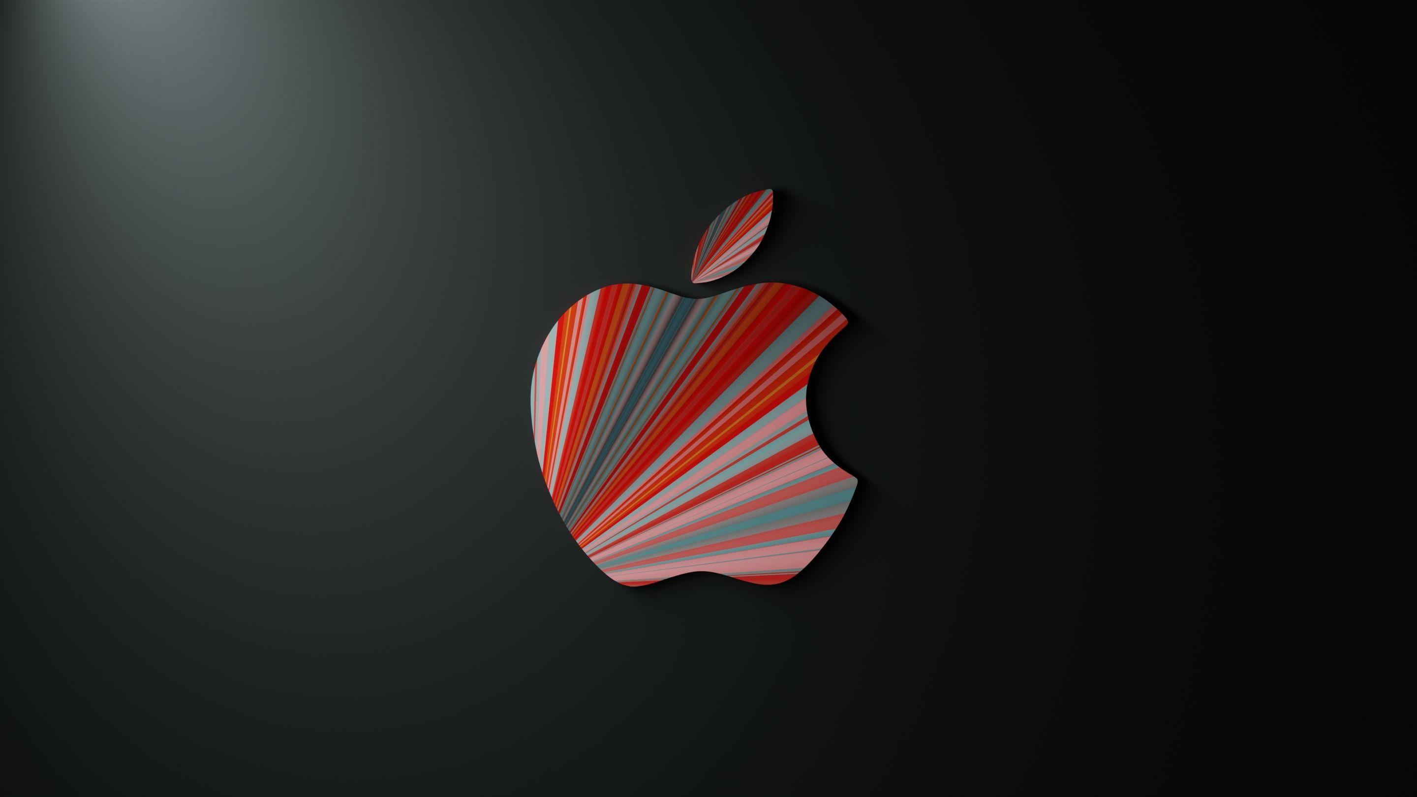 Colorful striped pattern on an apple-shaped design on a dark background, artistic and modern.