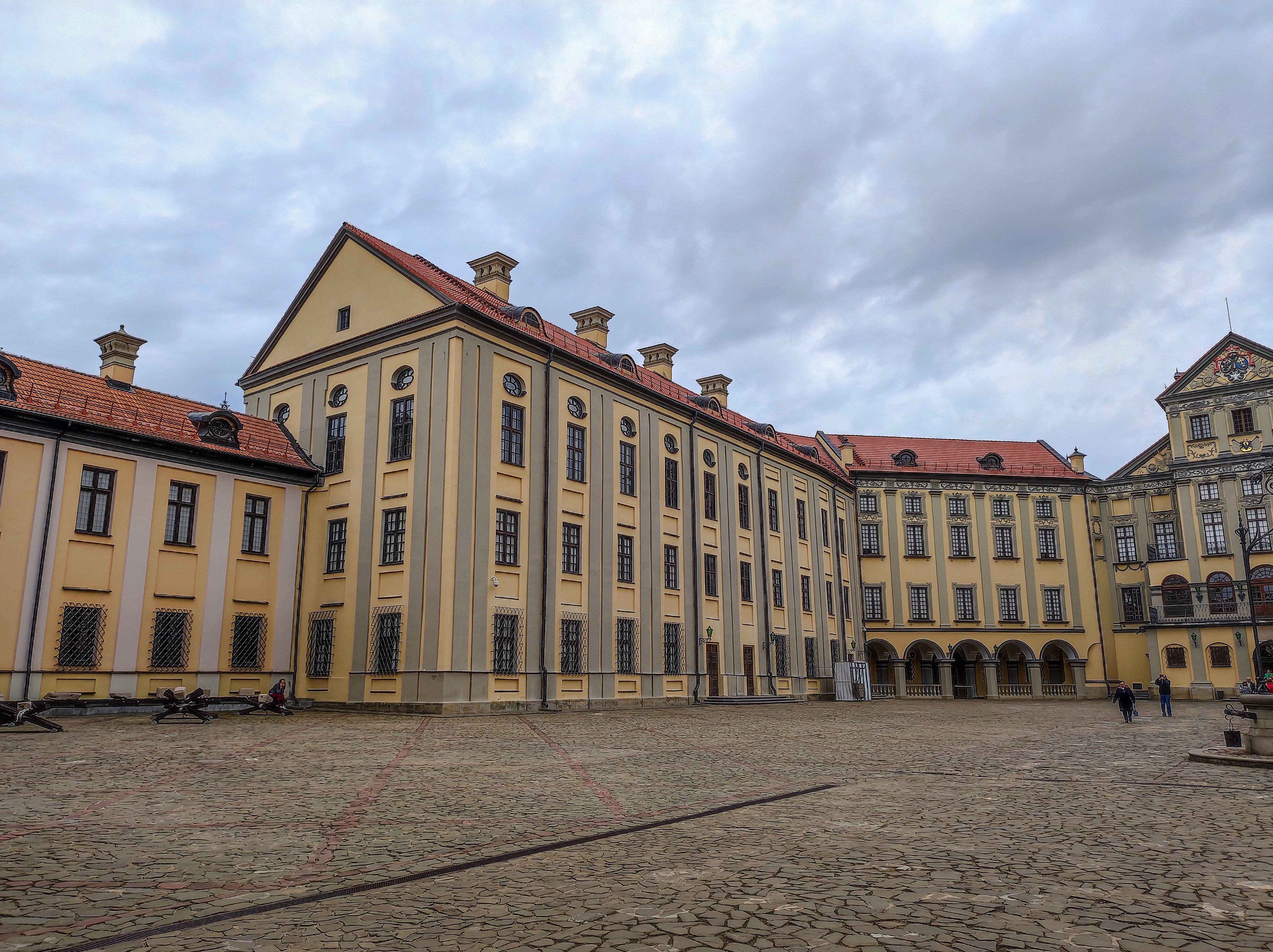 Historic Nesvizh Castle courtyard with architectural beauty in Belarus.