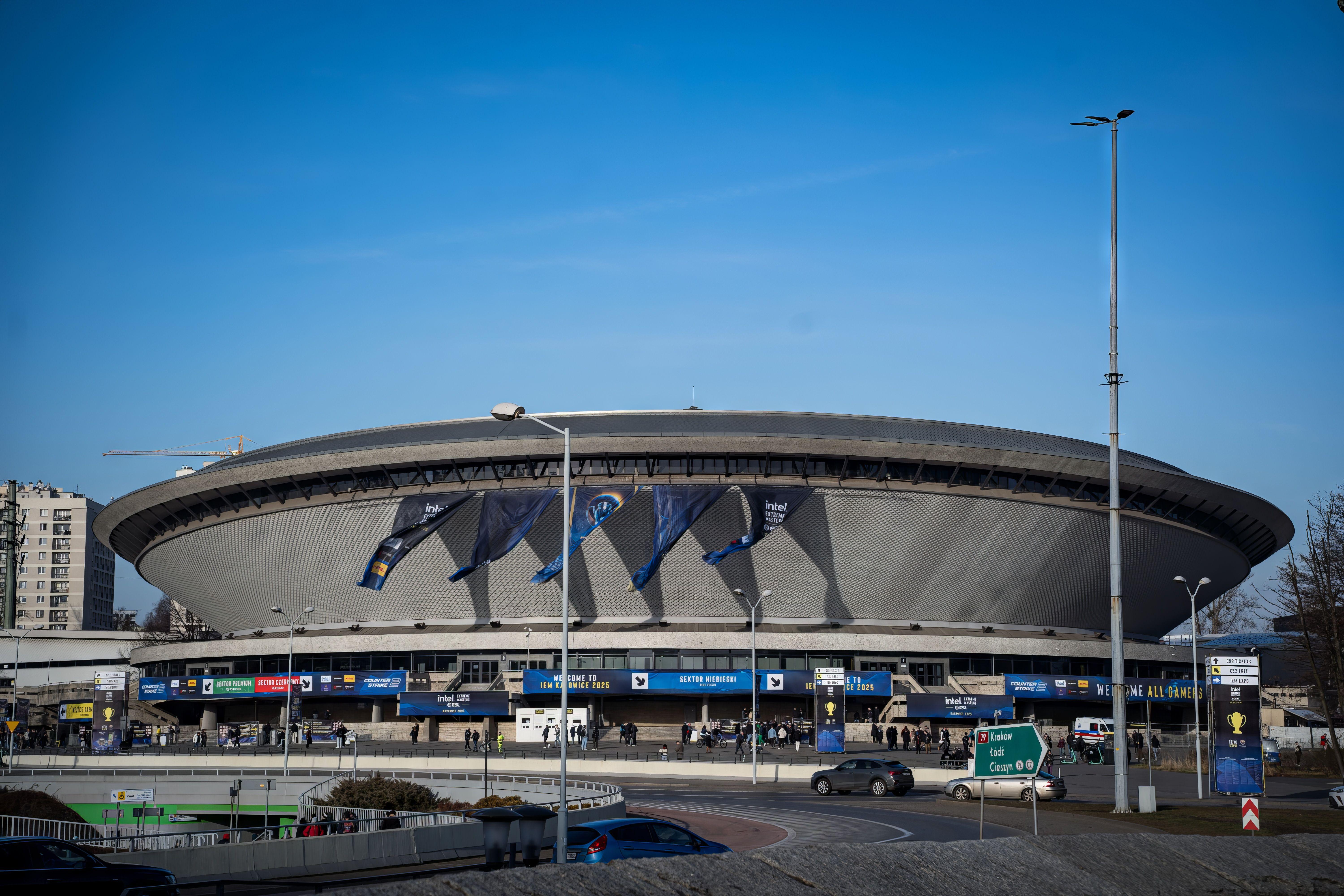 Spodek Arena in Katowice featuring a vibrant esports event atmosphere with banners.