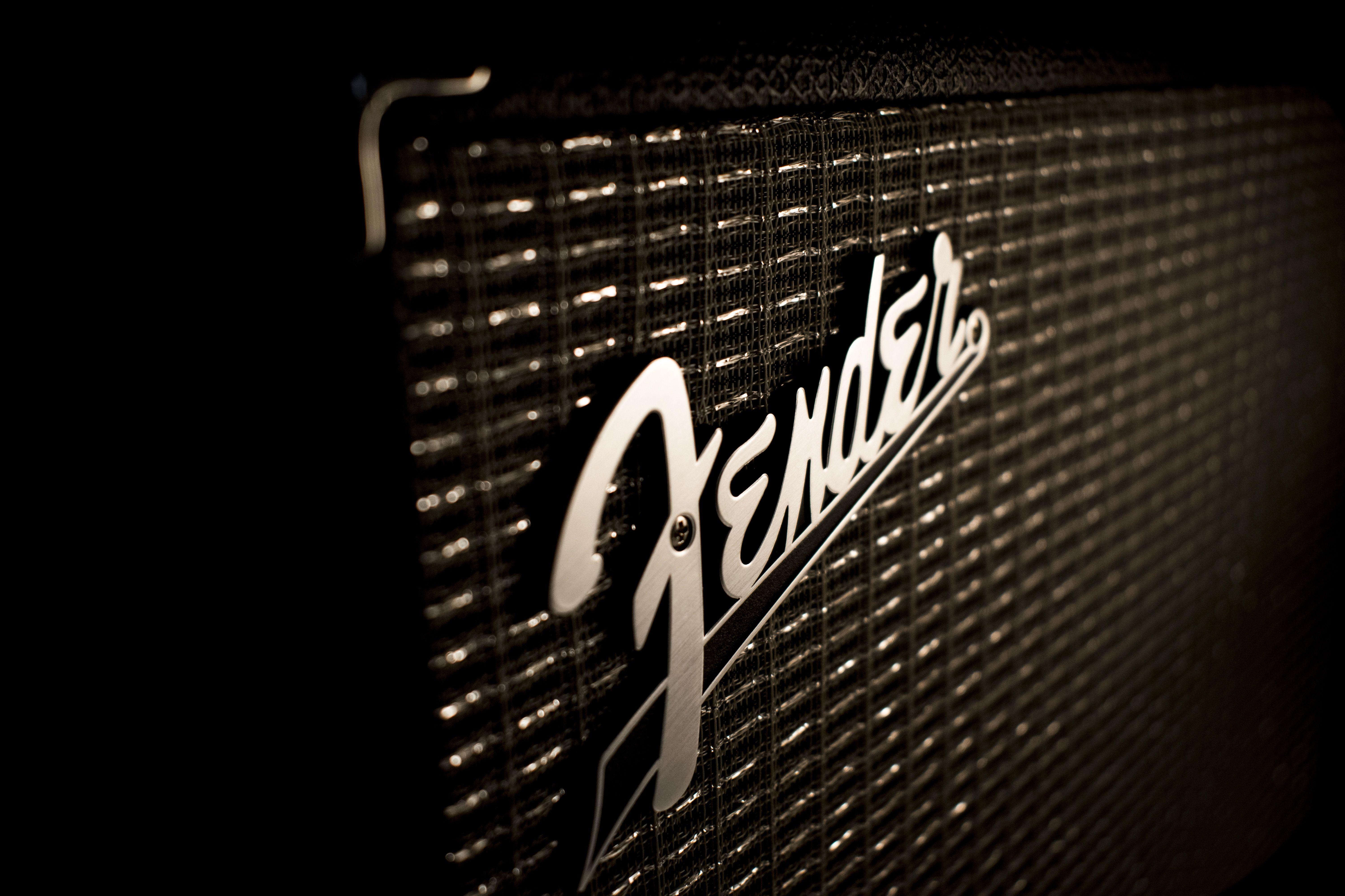 Artistic close-up of a vintage amplifier grill with textured design, showcasing classic music appeal.