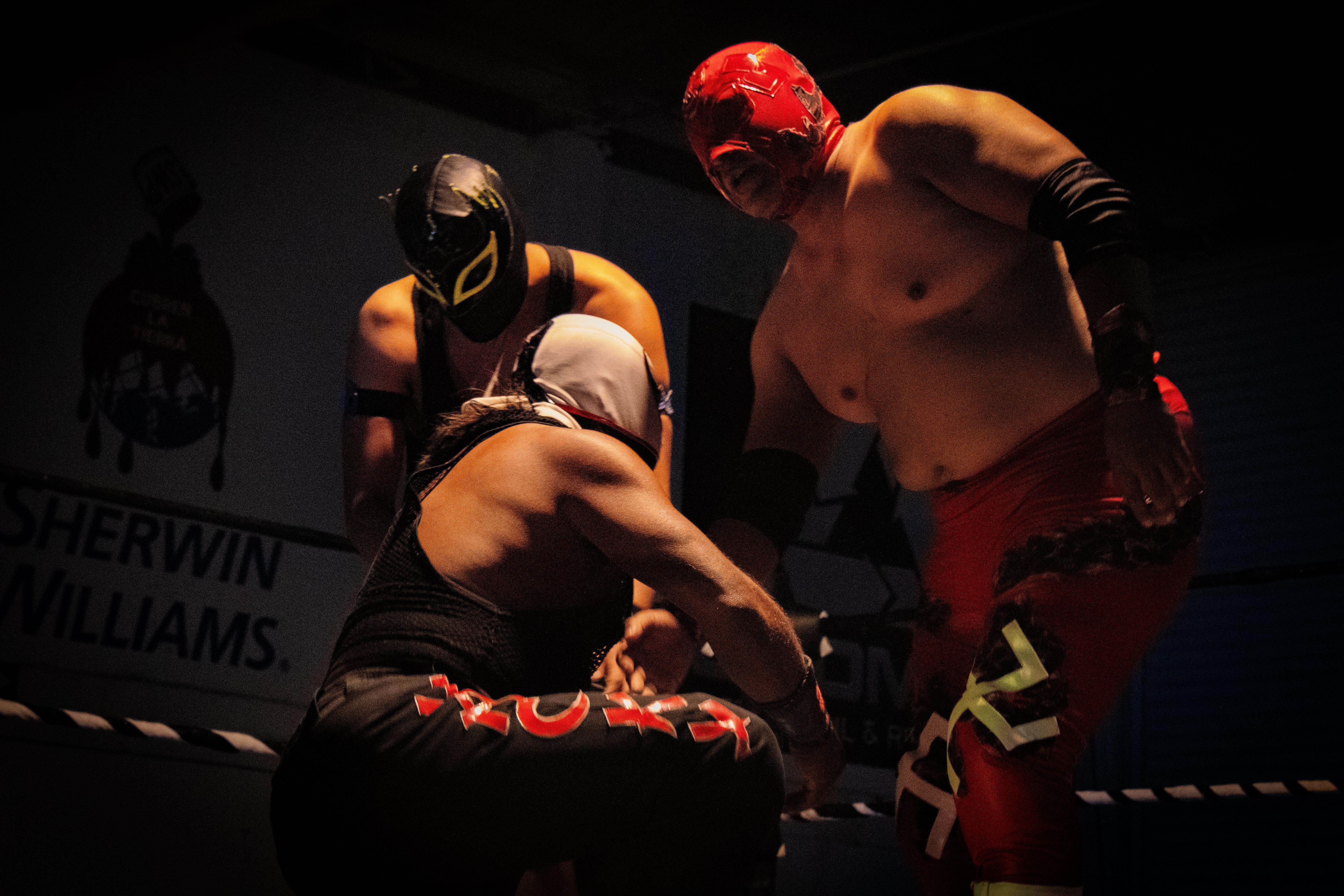 Masked wrestlers perform during an intense lucha libre match in León, Mexico.
