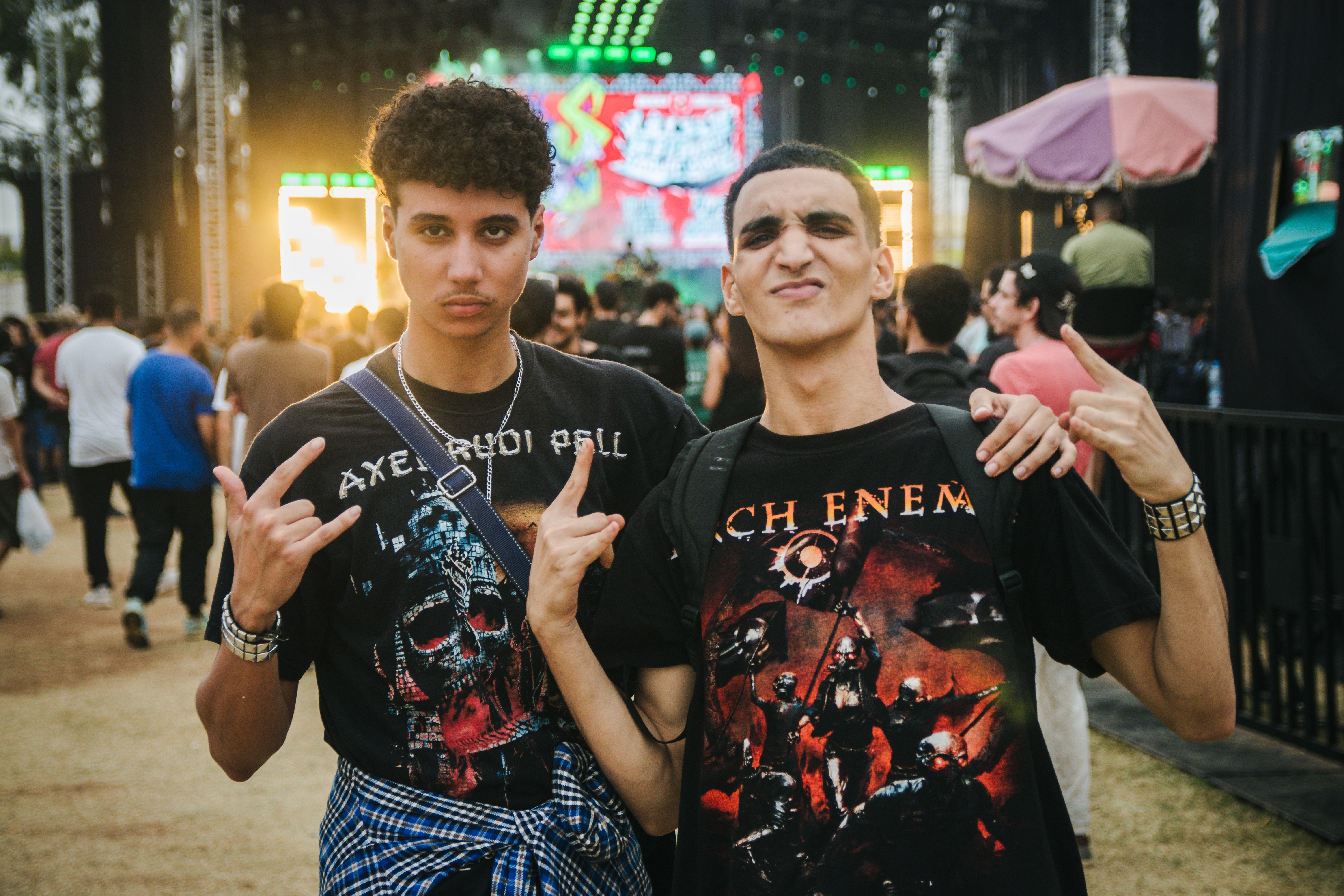 Two young adults enjoying a lively music festival in Casablanca, Morocco.