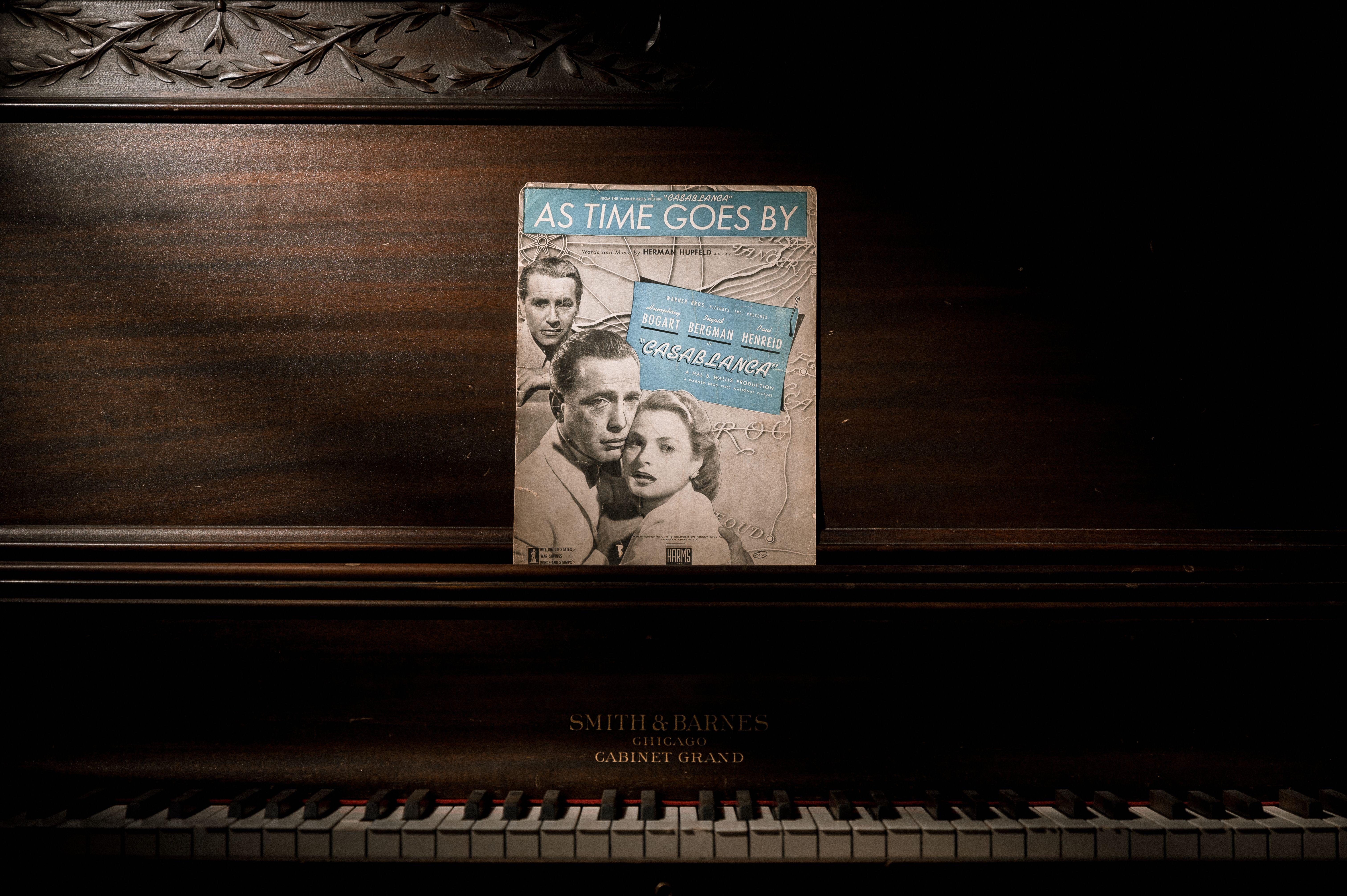 A vintage piano with a Casablanca movie music sheet evokes a classic, nostalgic atmosphere.