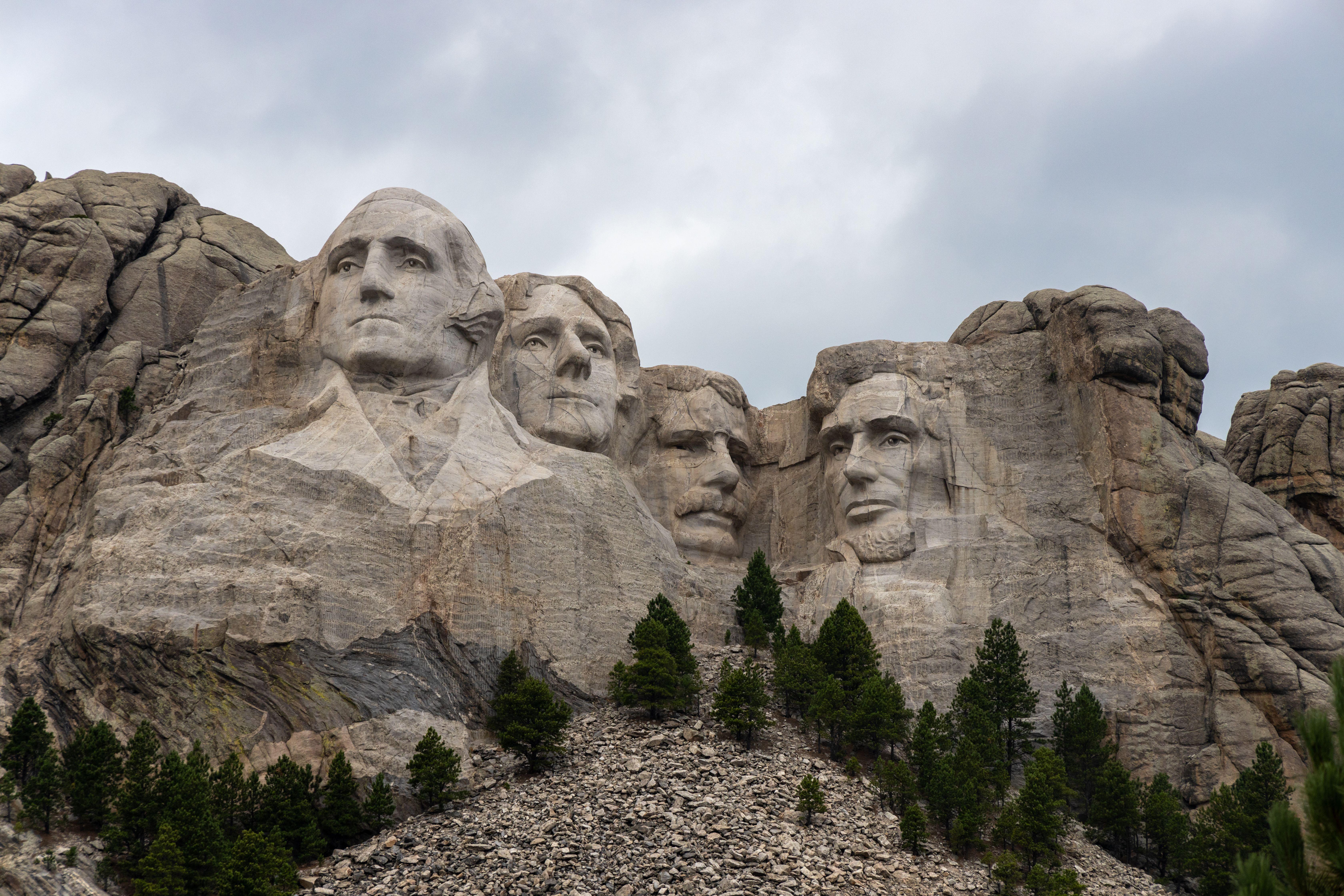 A striking view of Mount Rushmore featuring the carved faces of U.S. Presidents in the Black Hills of South Dakota.