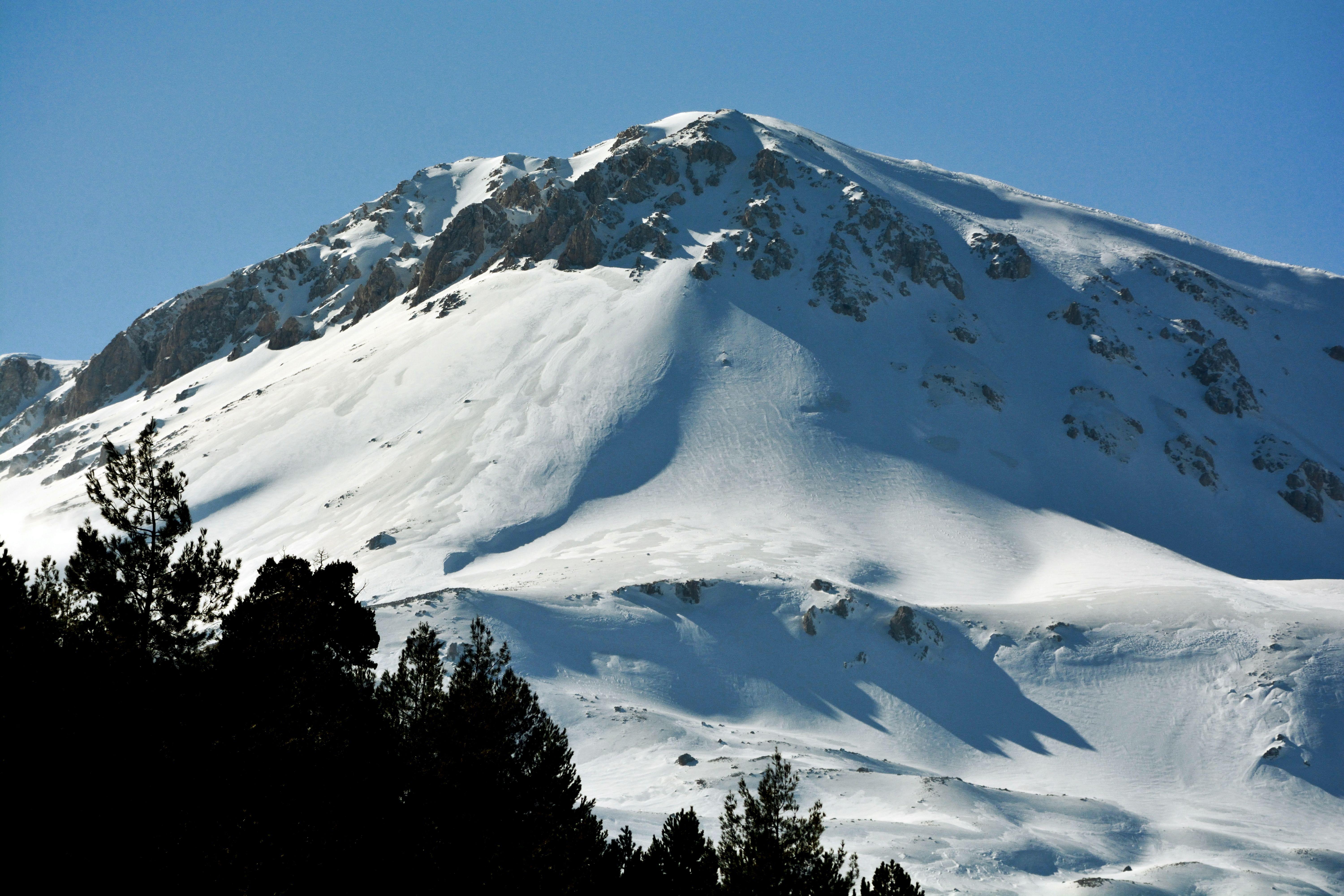 Stunning winter view of the Gömbe mountain summit covered in snow in Antalya, Türkiye.