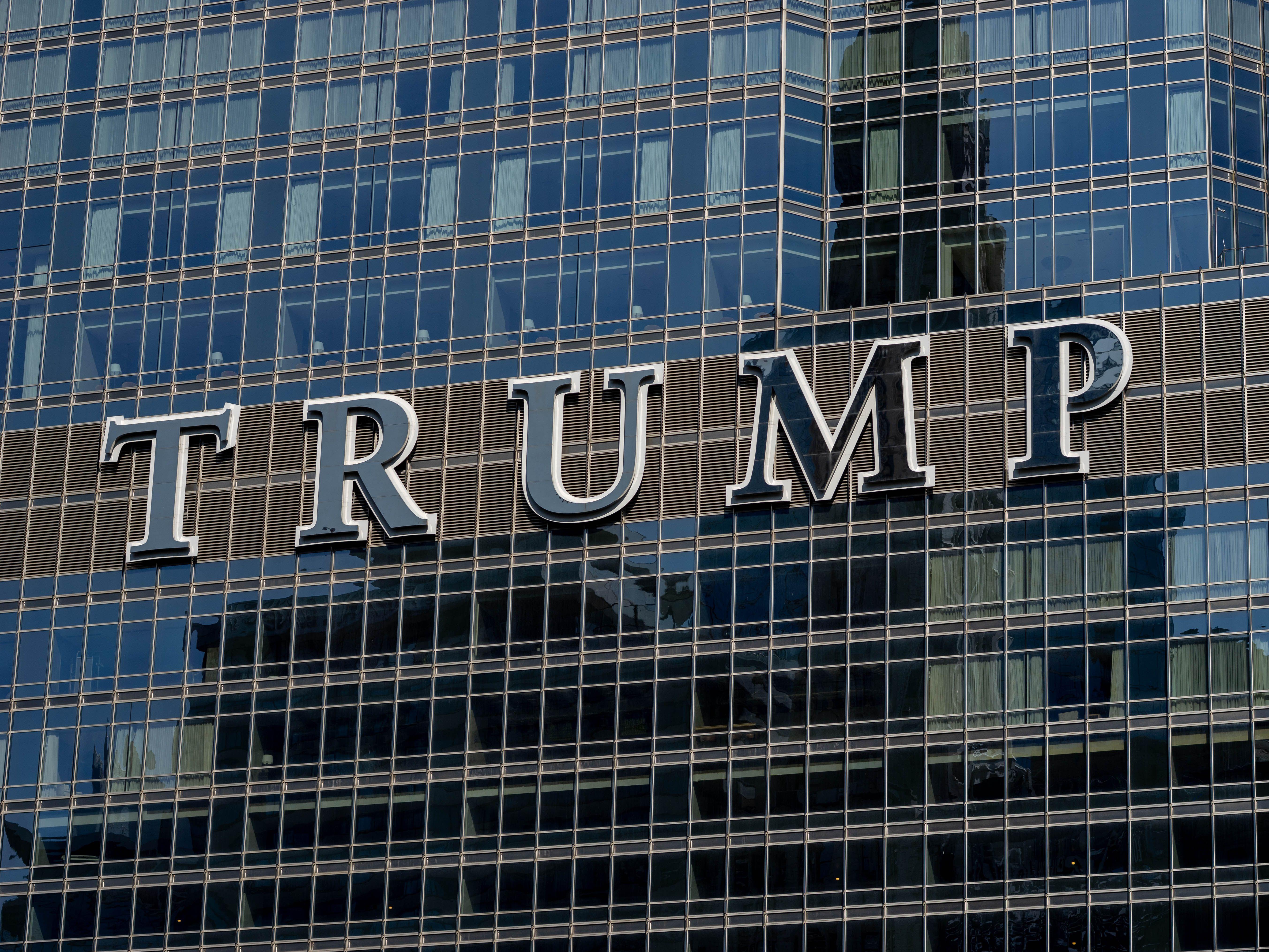 Detailed facade view of the Trump building with reflective glass windows.