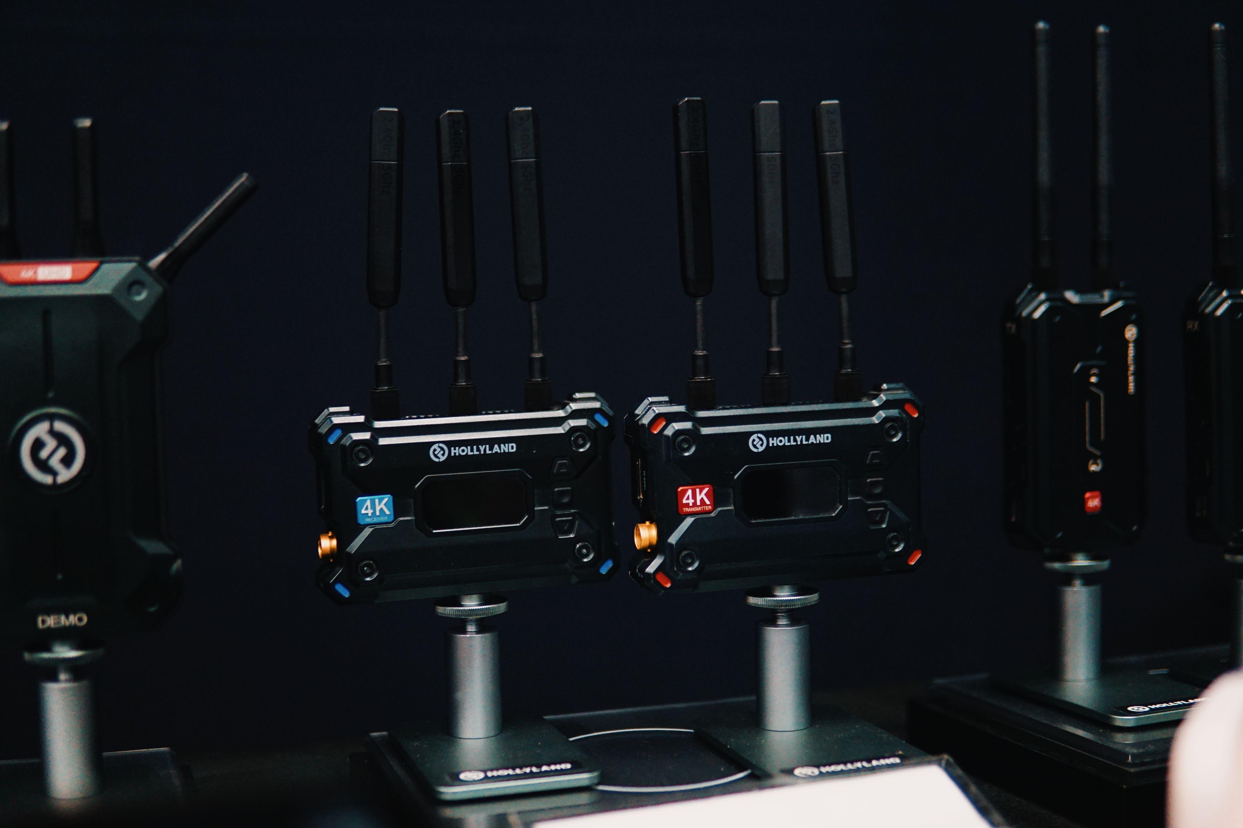 Close-up of wireless video transmitters on display, showcasing cutting-edge 4K tech.