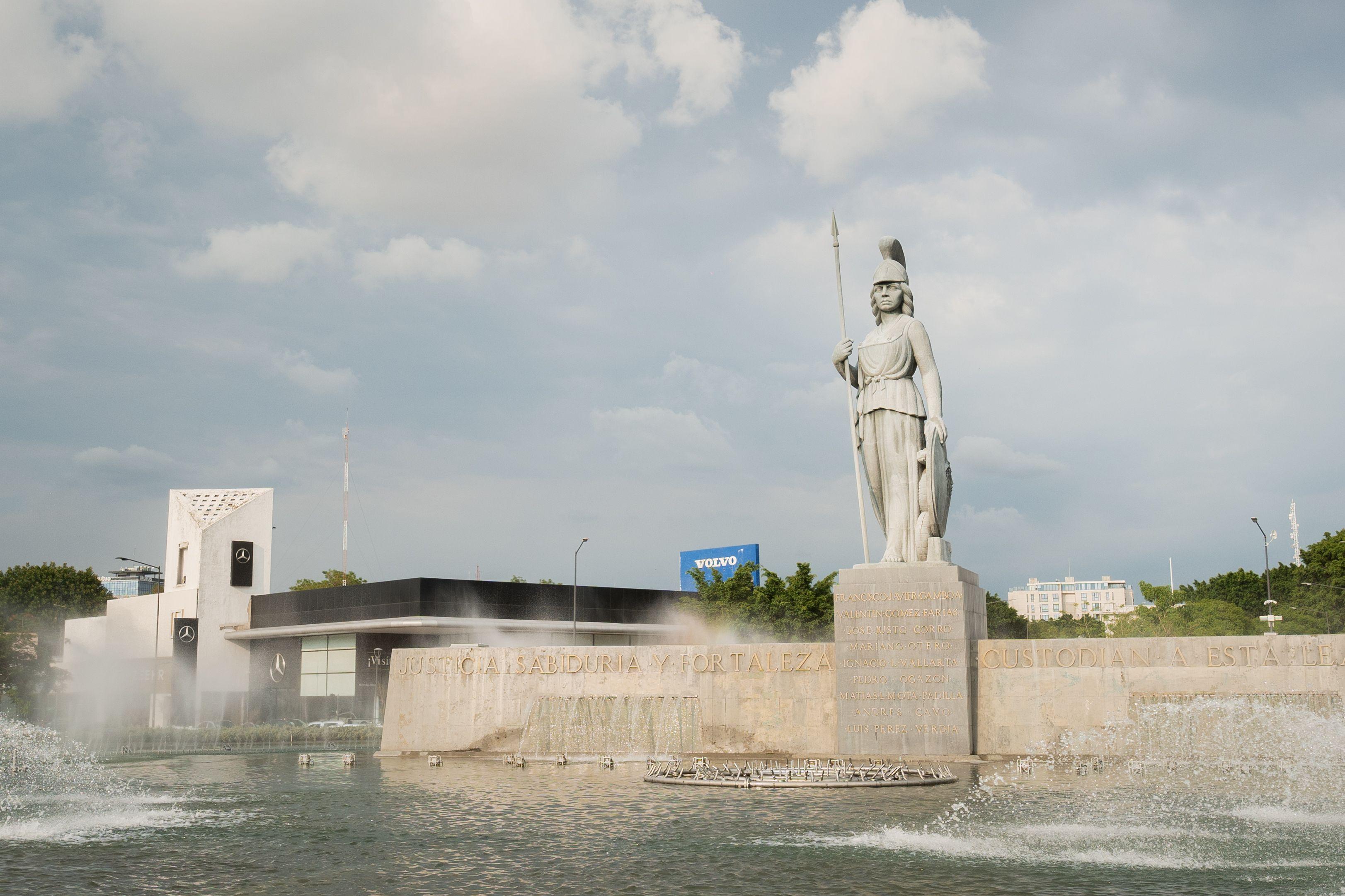 Majestic view of the Minerva Statue and Fountain in Guadalajara, Mexico. A symbol of strength and wisdom.