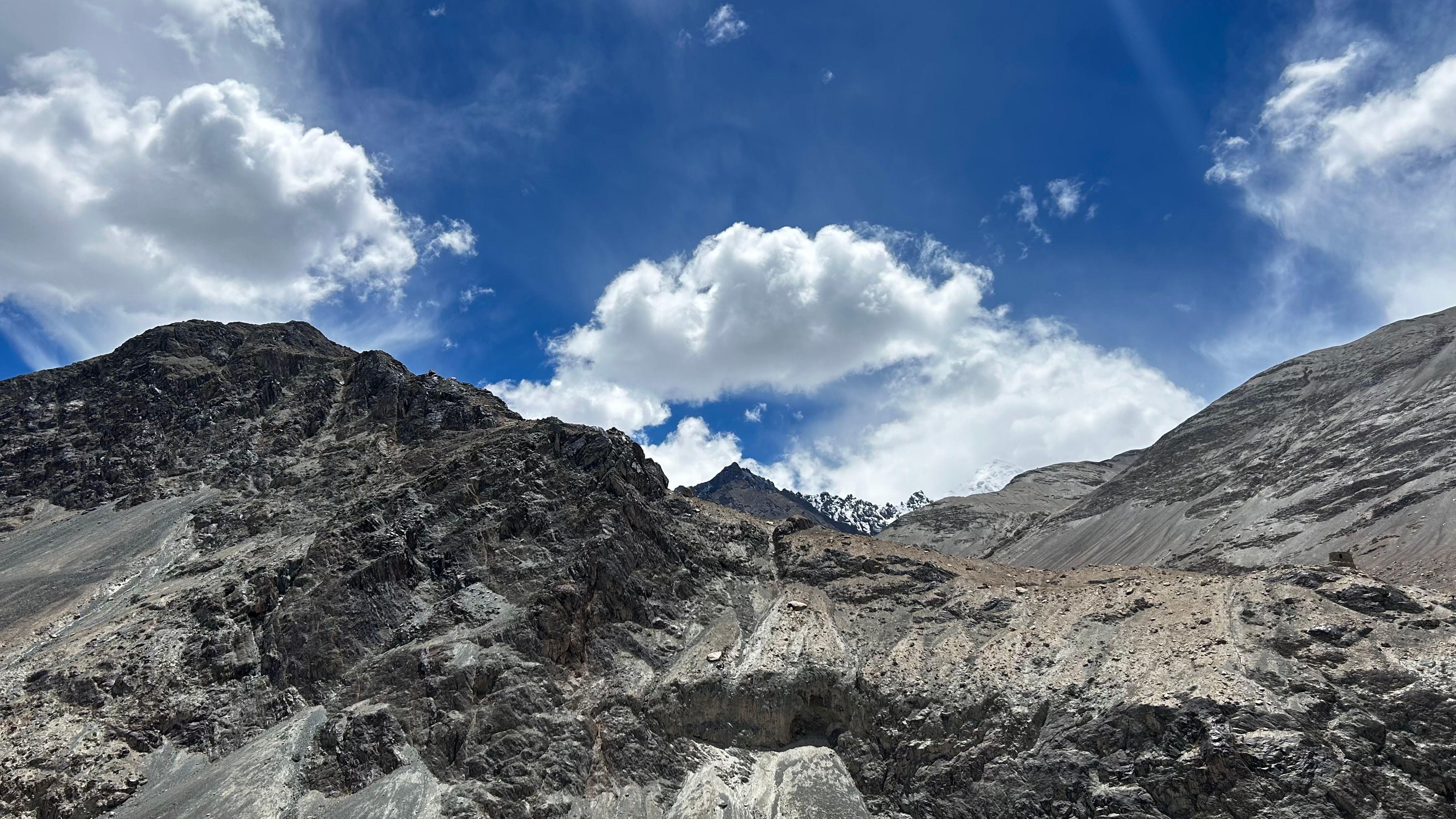 A captivating view of rugged mountains under a clear blue sky in Ladakh, India.