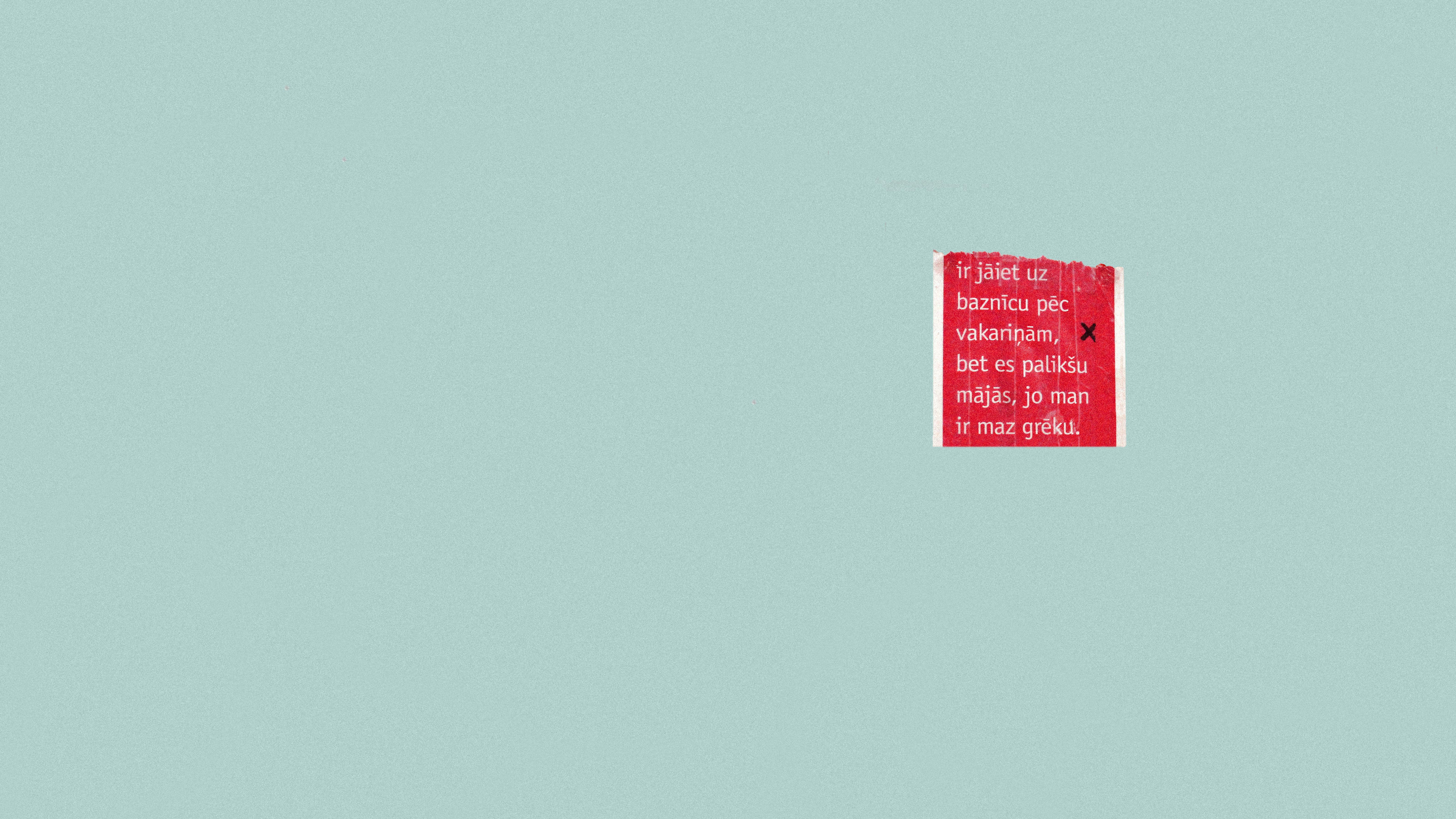 A minimalist composition featuring red text on a blue background, perfect for posters and desktop backgrounds.