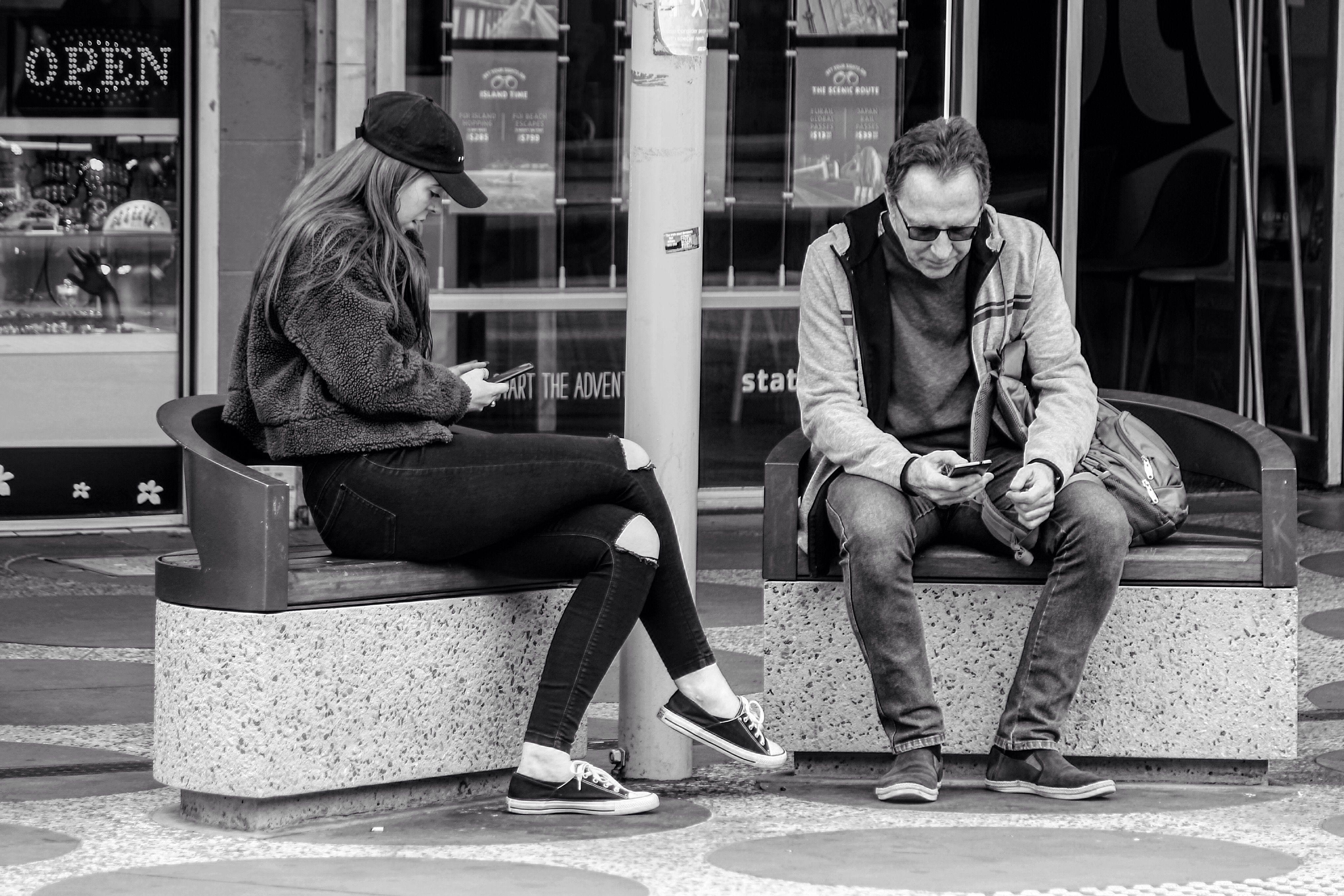 Candid street photography of people using smartphones in Melbourne, Australia.