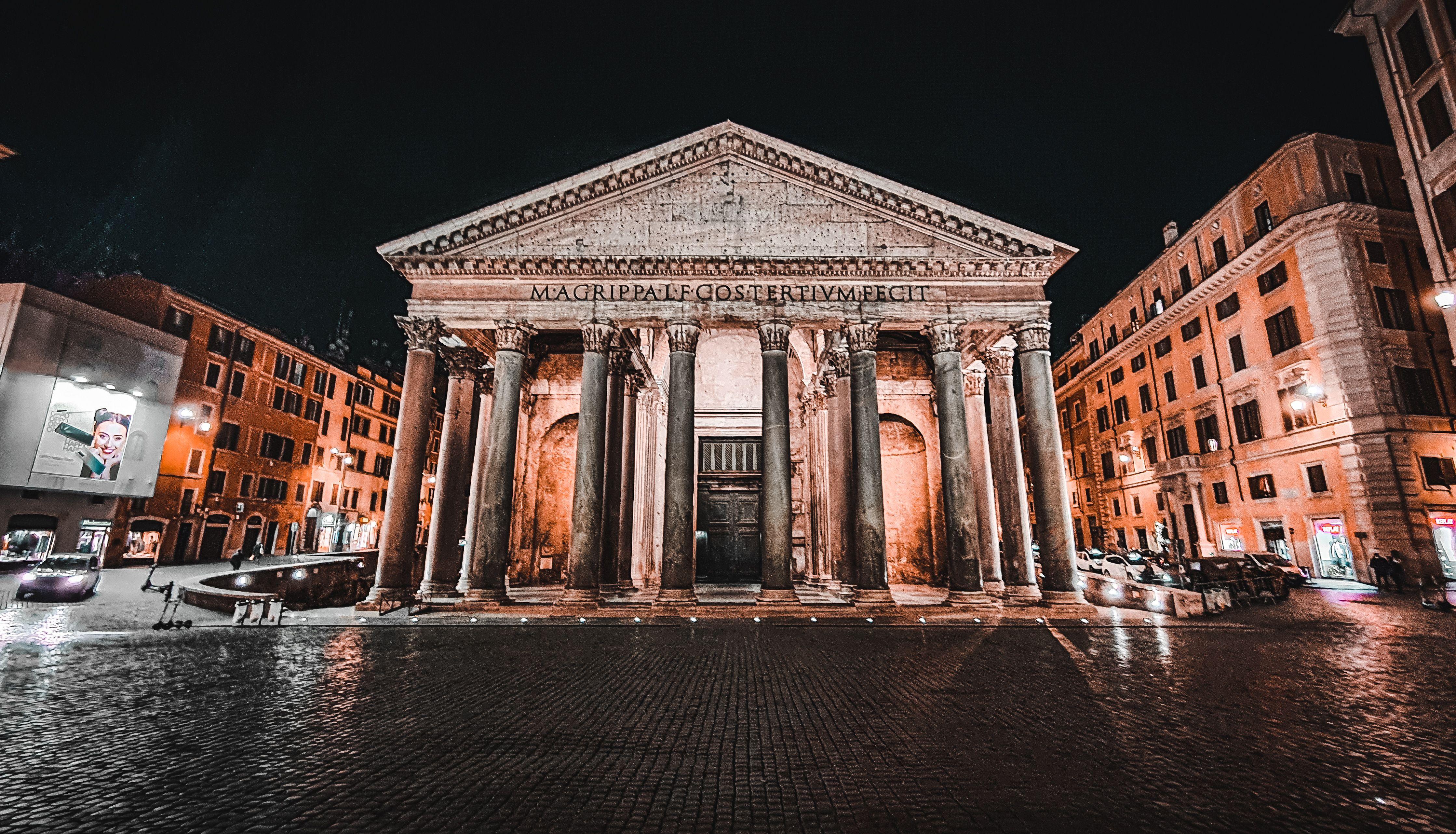 Captivating night photography of the ancient Pantheon in Rome, showcasing its grand architecture.