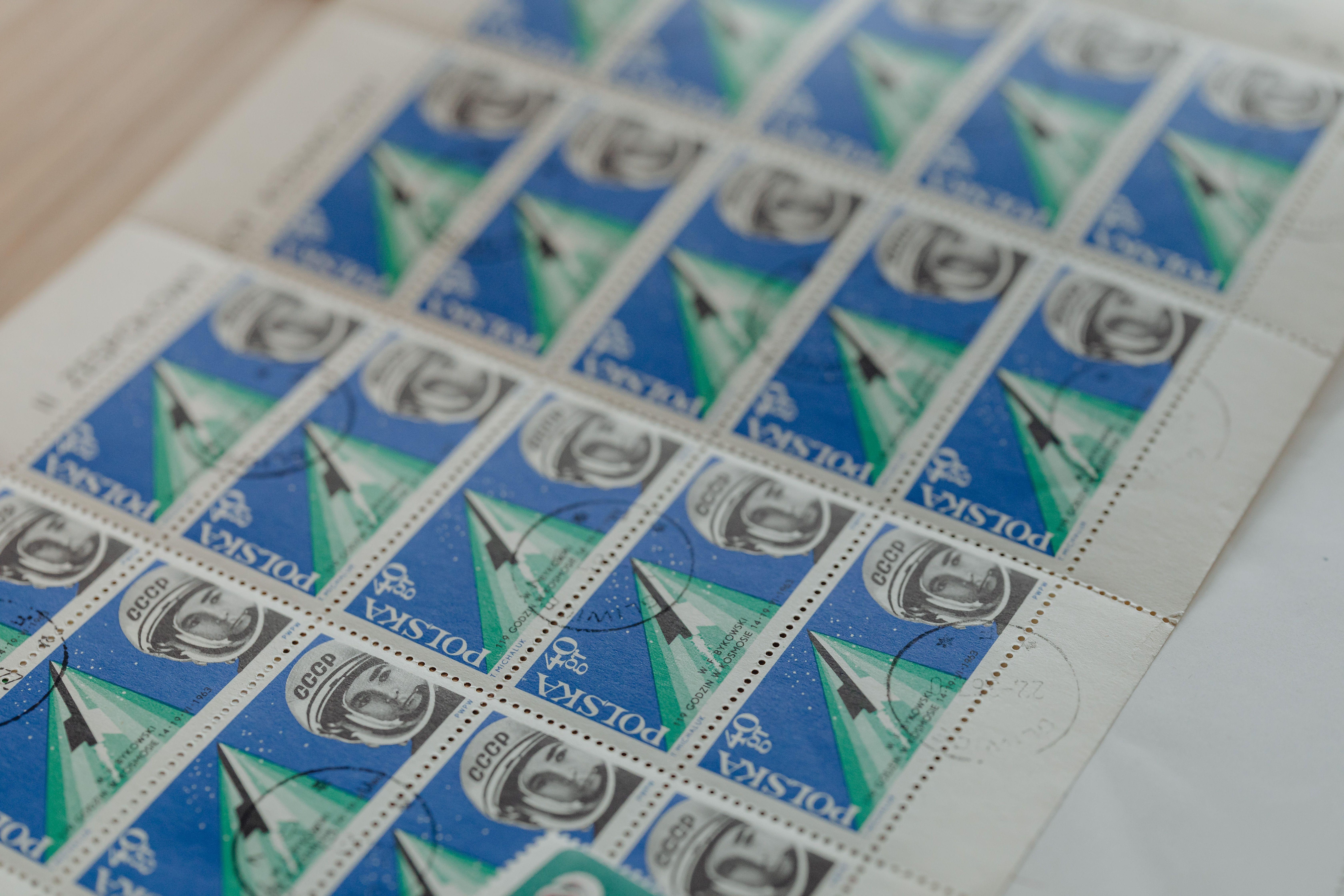Close-up of collectible Polish postage stamps depicting space exploration themes.