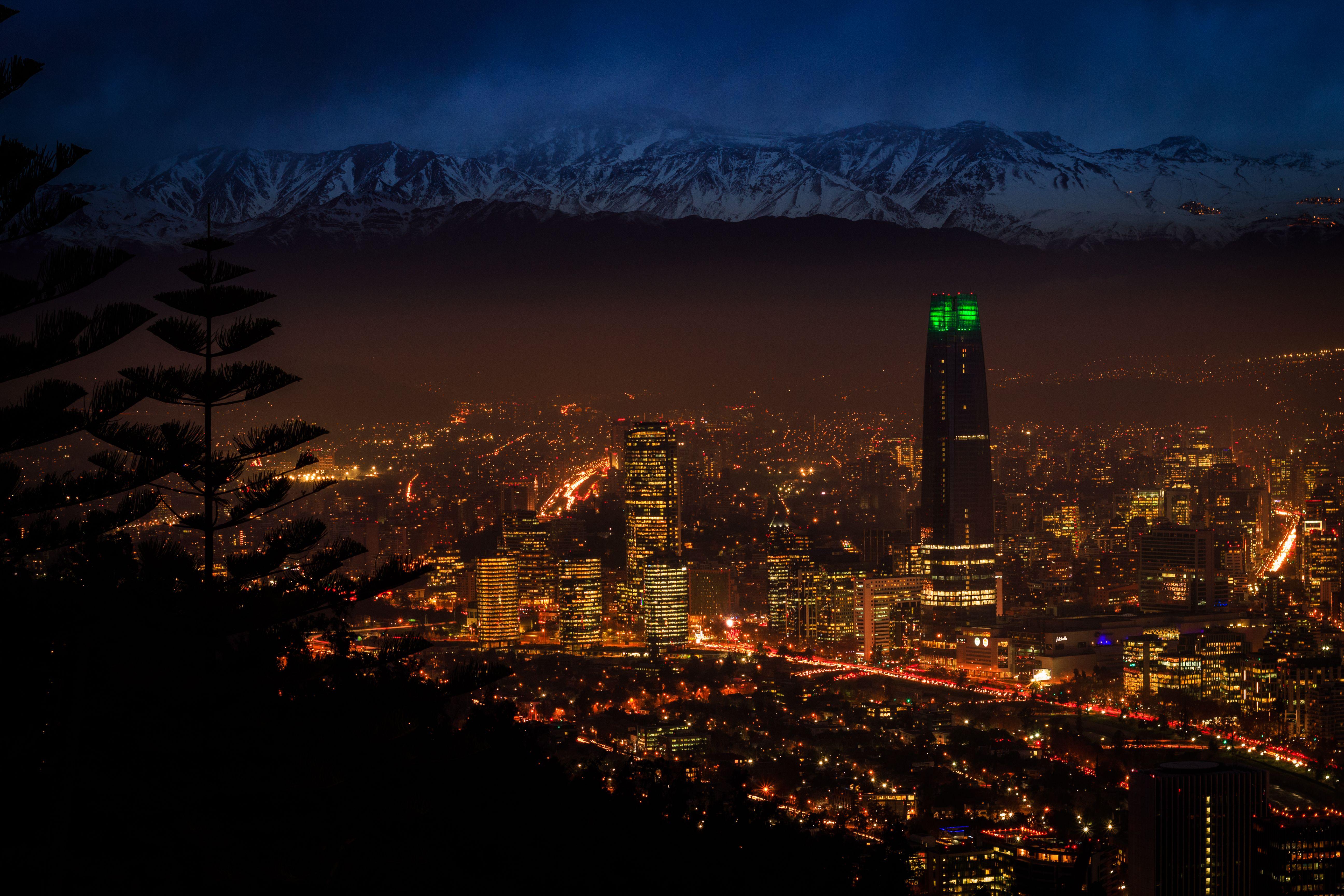 Beautiful night view of Santiago's skyline with the Andes mountains in the background.