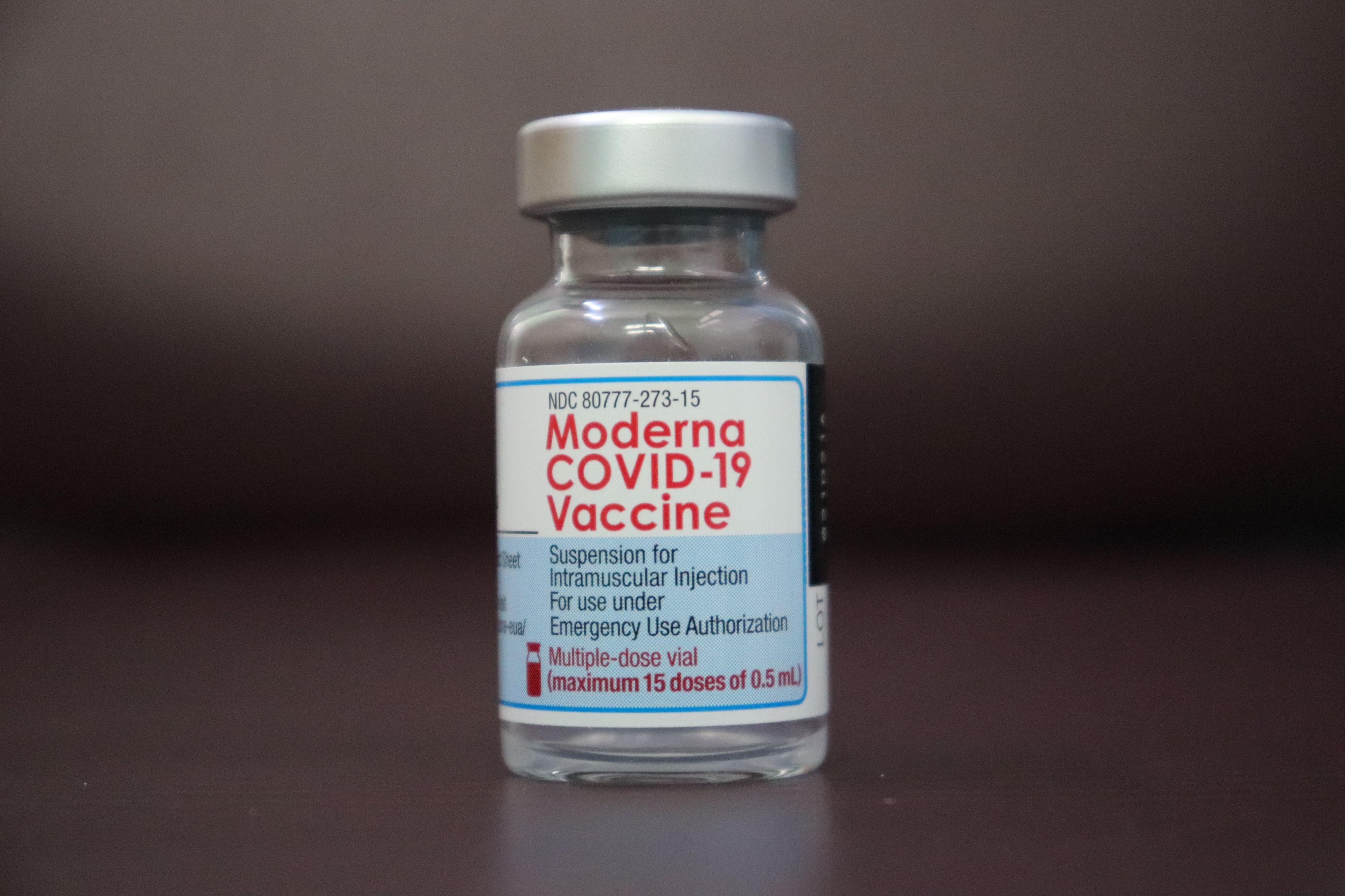 Close-up of a Moderna COVID-19 vaccine vial for emergency use authorization.