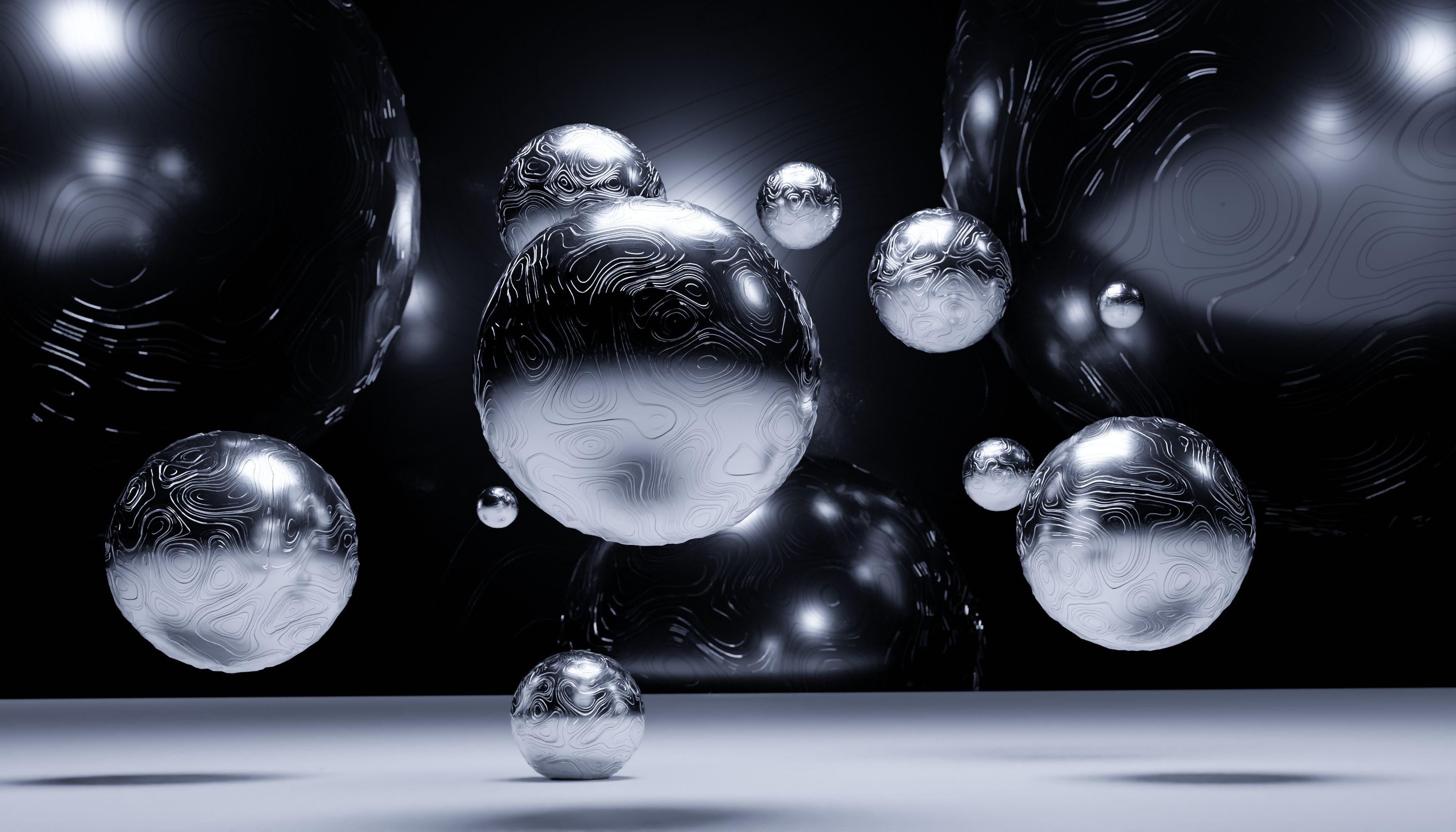 An abstract 3D visualization of floating silver balls with complex textures and shadows.