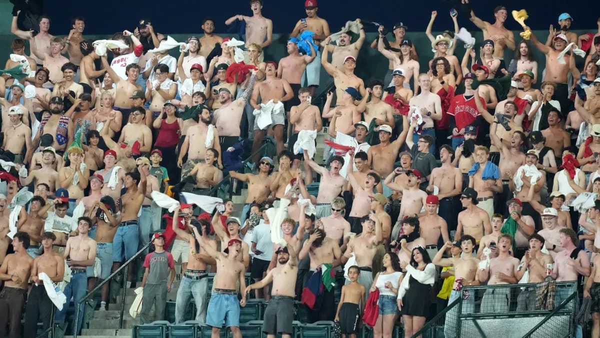 Red Sox fans shed shirts in numbers as part of largest 'tarps off' demonstration in history of movement