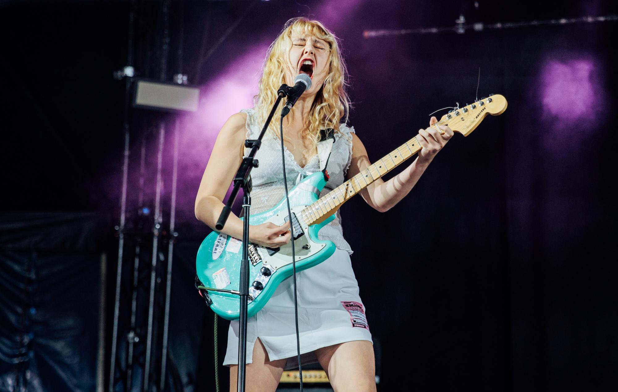 Lambrini Girls reschedule North American tour and pull out of Coachella after Phoebe Lunny reveals neck fracture and “acute brain injury”