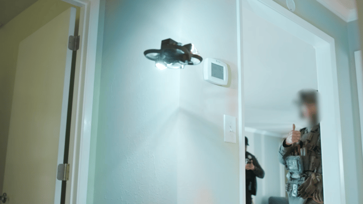 Odd police video shows drone removing knife from motionless suspect