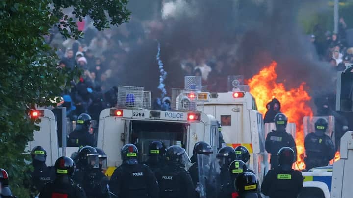 Police fire water cannon in Belfast as stabbing sparks second night of unrest