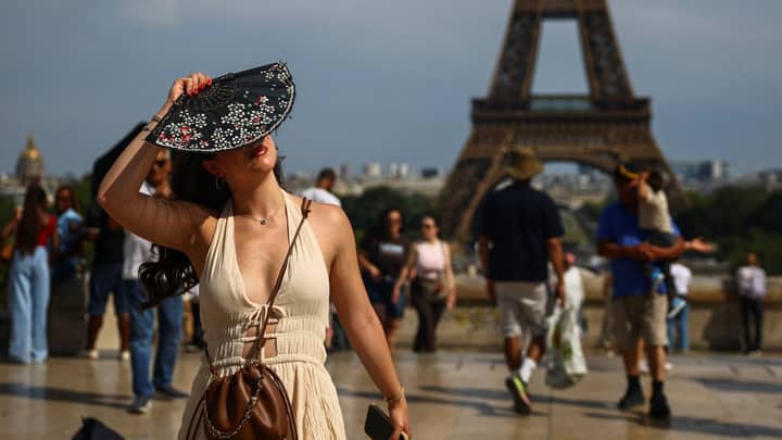 Hot and bothered Europeans finally warm to air con