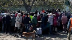 To stay or risk the 'Road of Death' - Ukrainian civilians trapped in frontline city
