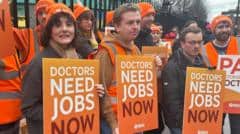 Don't put off treatment during doctors' strike, NHS tells patients