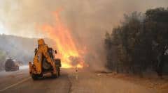 Two firefighters die in Crete as wildfires threaten parts of southern Europe