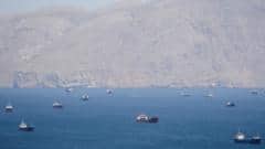 US threatens shipping firms with sanctions if they pay Iran tolls