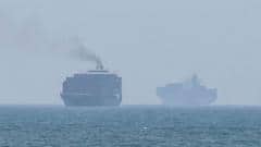 Hormuz talks positive, Oman says, as Iran warns deal would not open strait