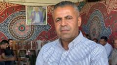 His father had just been buried. Then West Bank settlers forced him to dig up the body