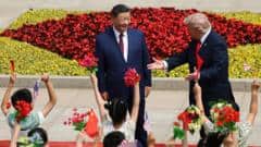 Flattery and fanfare as Trump welcomed to China - but thorny issues remain