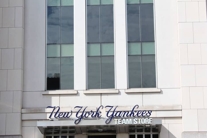 Close-up of the New York Yankees Team Store facade, featuring modern architecture.