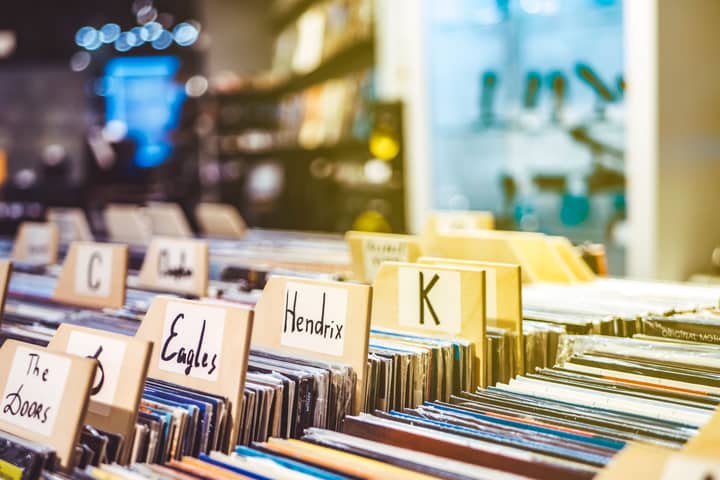 Explore the charm of a vintage vinyl record store with diverse classic albums on display.