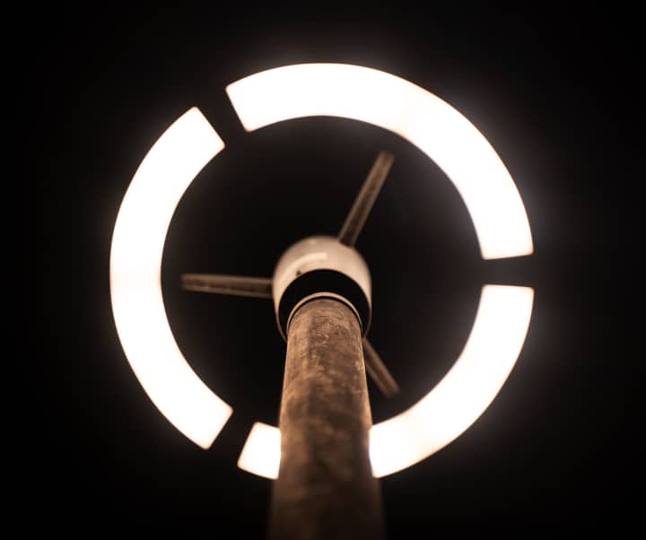 Unique view of a modern street lamp illuminating the night in Jalandhar, India.