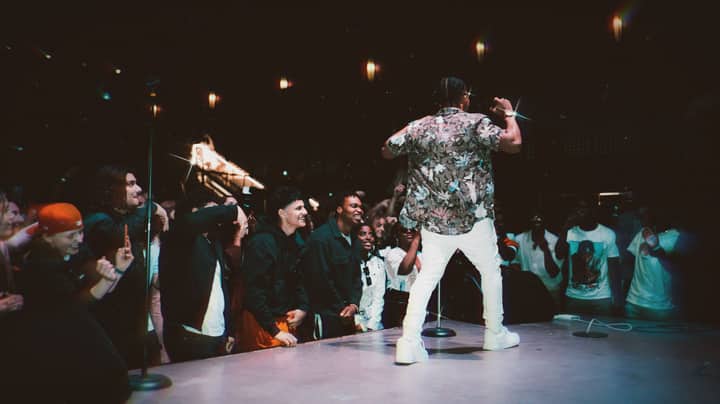 Singer energizes the crowd during a live performance in Edmonton, Canada.