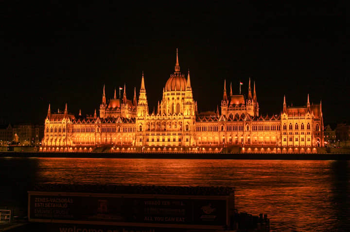 Stunning night view of the illuminated Hungarian Parliament Building in Budapest.