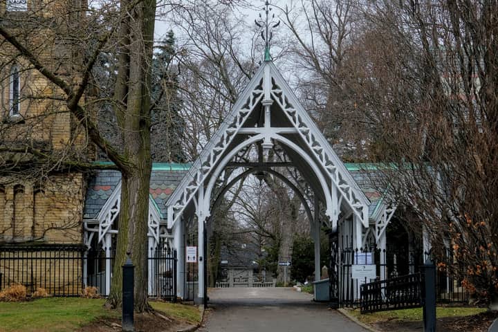 Ornate Gothic-style entrance gate at St. James Cathedral in Toronto, showcasing architectural elegance.