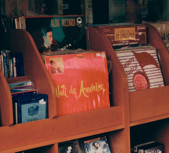 Close-up of vinyl records in a Mexican music store showcasing nostalgic retro vibes.
