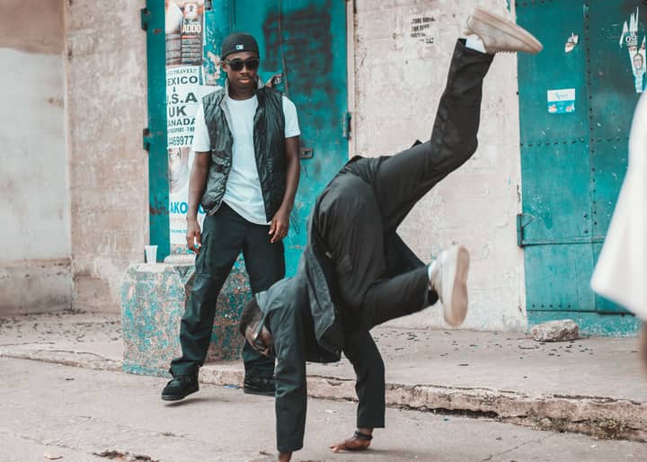 Dynamic street dance scene showcasing urban hip-hop culture with stylish performers.